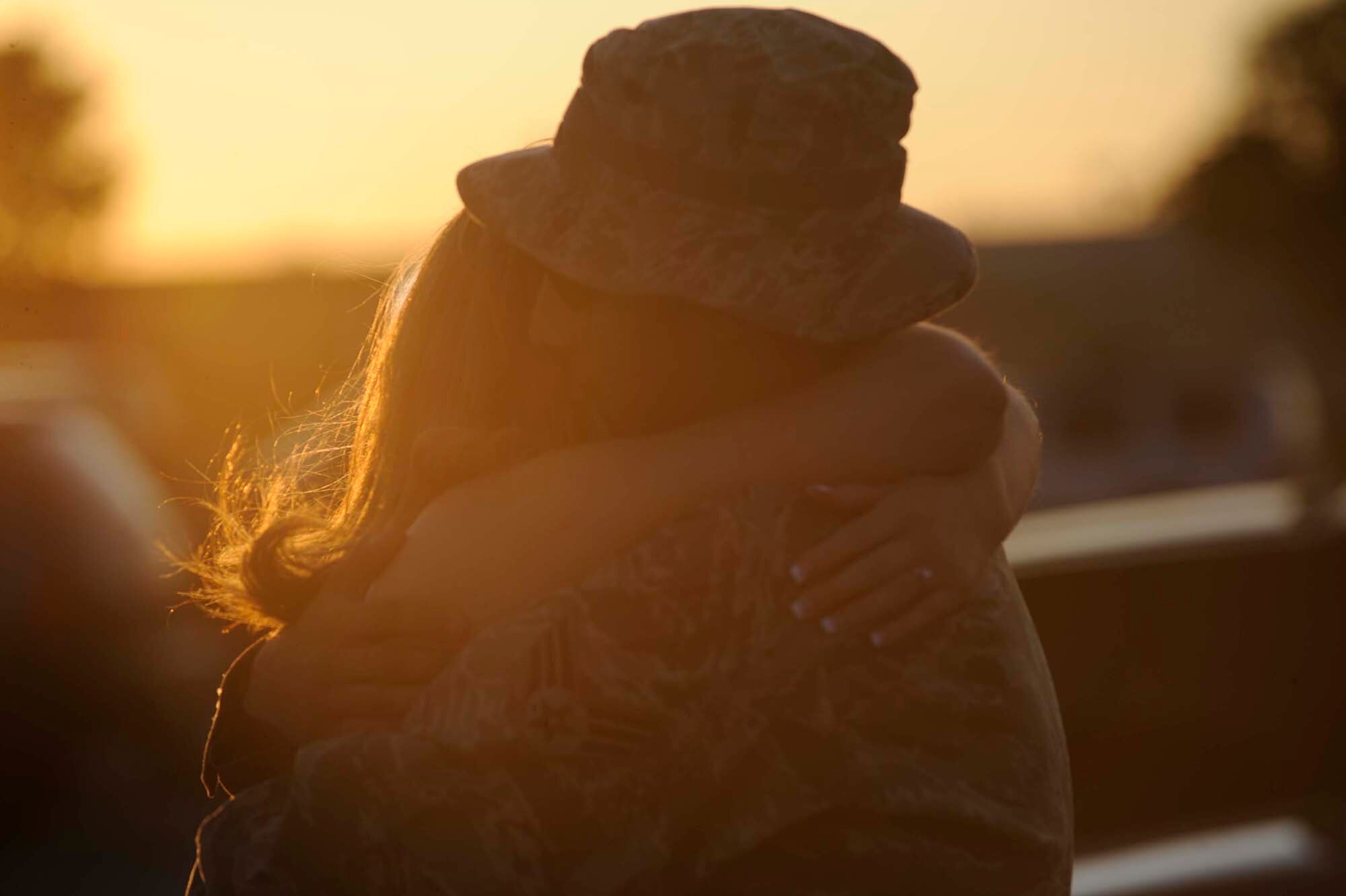 Senior Airman Spencer Hensinger, 28th Aircraft Maintenance Squadron structural maintenance journeyman, says goodbye to his fiancé, Mandy Wroth, before deploying July 21. Ellsworth Airmen in various roles deployed in support of operations at the 379th Air Expeditionary Wing in Southwest Asia. (U.S. Air Force photo by Airman 1st Class Corey Hook)
