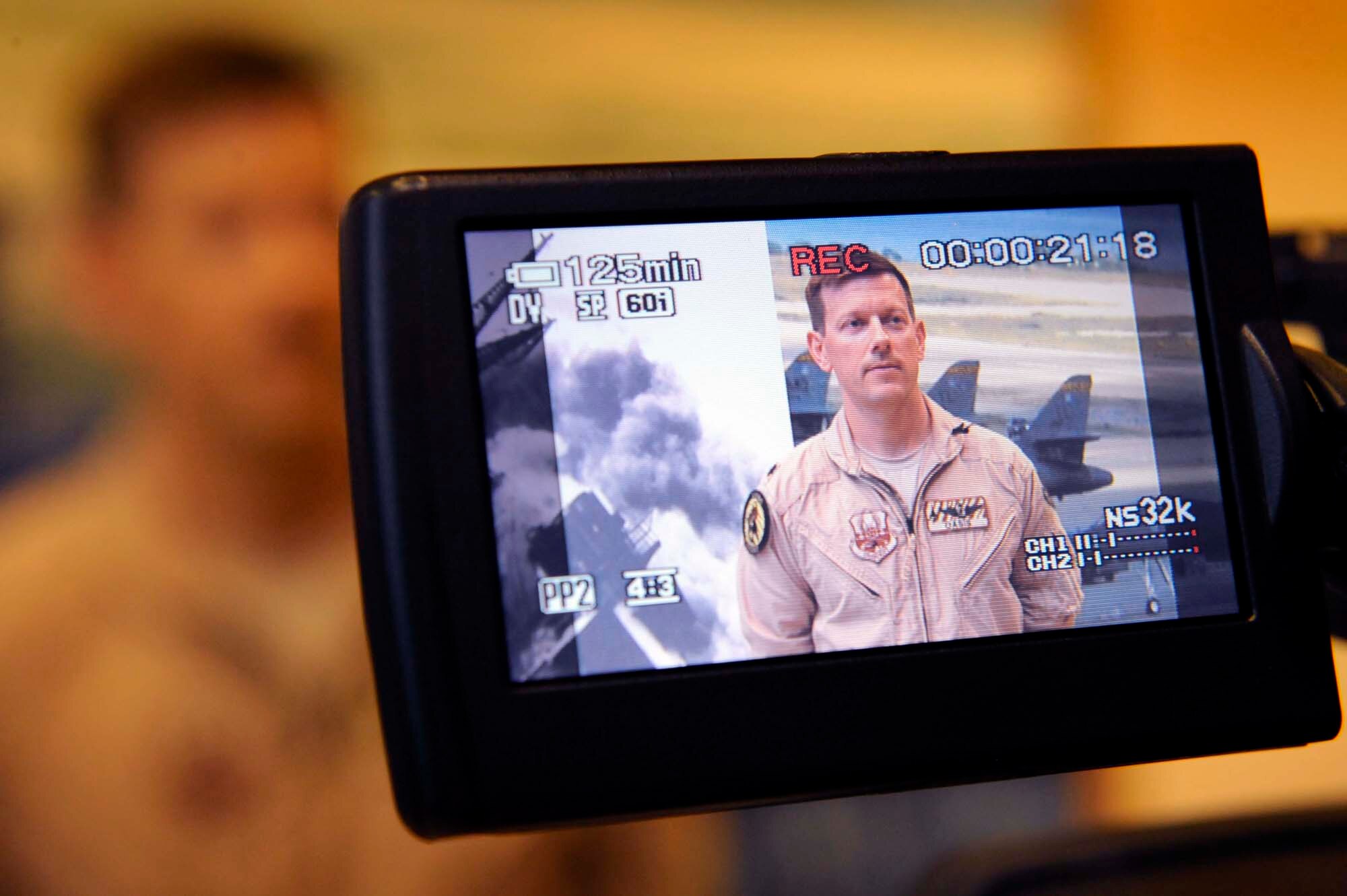 The 37th Bomb Squadron director of operations is interviewed before deploying July 21. Airmen representing various specialties deployed in support of operations at the 379th Air Expeditionary Wing in Southwest Asia. (U.S. Air Force photo by Airman 1st Class Corey Hook)