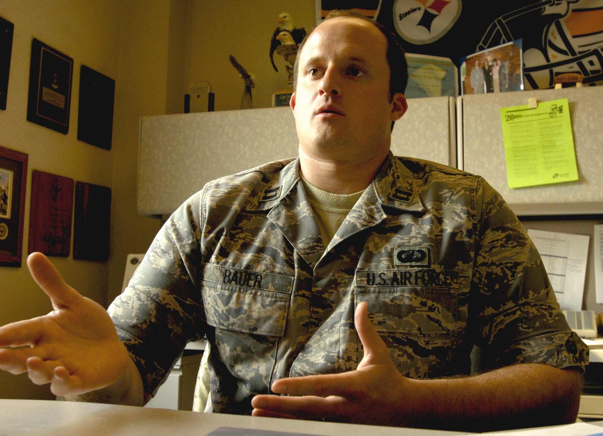 ELMENDORF AIR FORCE BASE, Alaska -- Capt. Douglas Bauer, 3rd Comptroller Squadron, explains how the end-of-year closeout process works. Bauer is in charge  of handling the 11th Air Force budget. (U.S. Air Force photo/Airman 1st Class Christopher Gross)