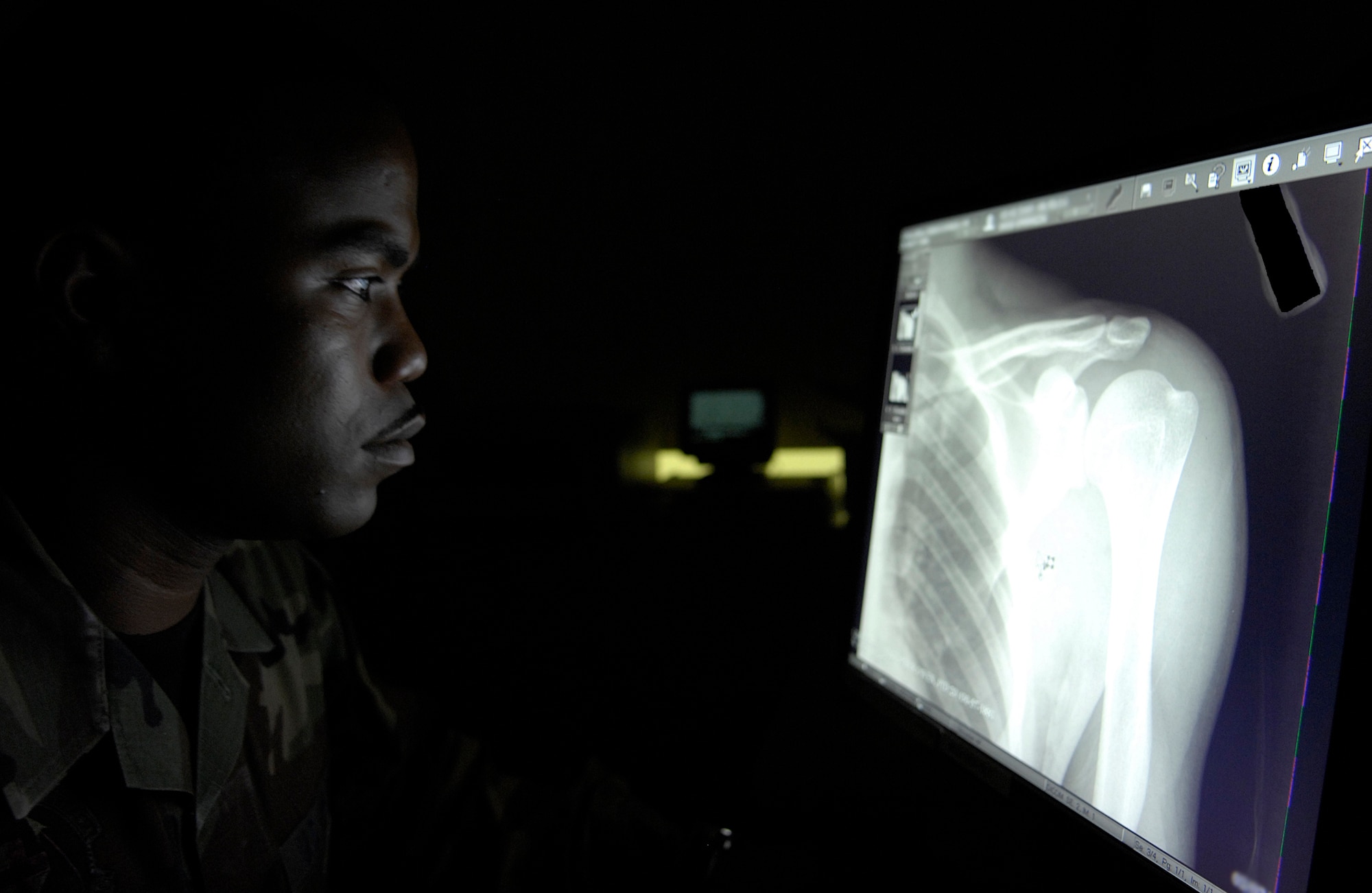 VANDENBERG AIR FORCE BASE, Calif. -- Staff Sgt. Christopher LimaLima a diagnostc imaging craftsman of the 30th Medical Operations Squadron, reviews a radiograph of a recent patient here July 7. The 30th MDSS keeps Airmen healthy and ready to deploy so they can support the mission. (U.S. Air Force photo/Airman 1st Class Andrew Lee) 
 