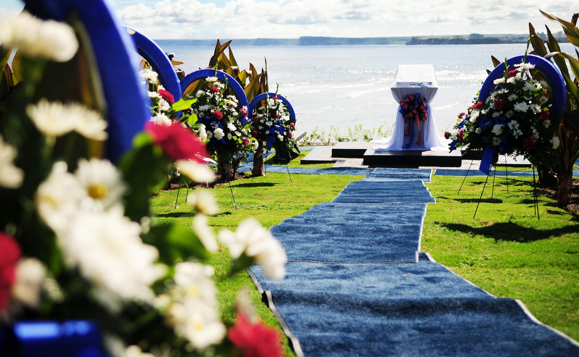 These wreaths represent each of the six Airmen who were flying the B-52 Stratofortress -- call sign RAIDR 21 -- that crashed off the coast of Guam July 21, 2008.  The wreaths were laid in front of the memorial July 20 during an unveiling ceremony at the Governor's Complex at Adelup Point in Hagatna, Guam. Family, friends and co-workers of RAIDR 21 along with members of the local Guam community honored the memory of the Airmen with the ceremony and the unveiling of the monument. (U.S. Air Force photo/Airman 1st Class Courtney Witt)