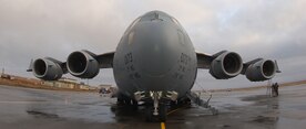 EARCKESON AIR STATION, Alaska -- A 517th Airlift Squadron C-17 Globemaster III sits on the airfield during a recent visit. The airfield, constructed in the early 1940s and last resurfaced in 1976, is now tasked with supporting heavier and more complex aircraft, is sorely in need of repairs. (U.S. Air Force file photo)