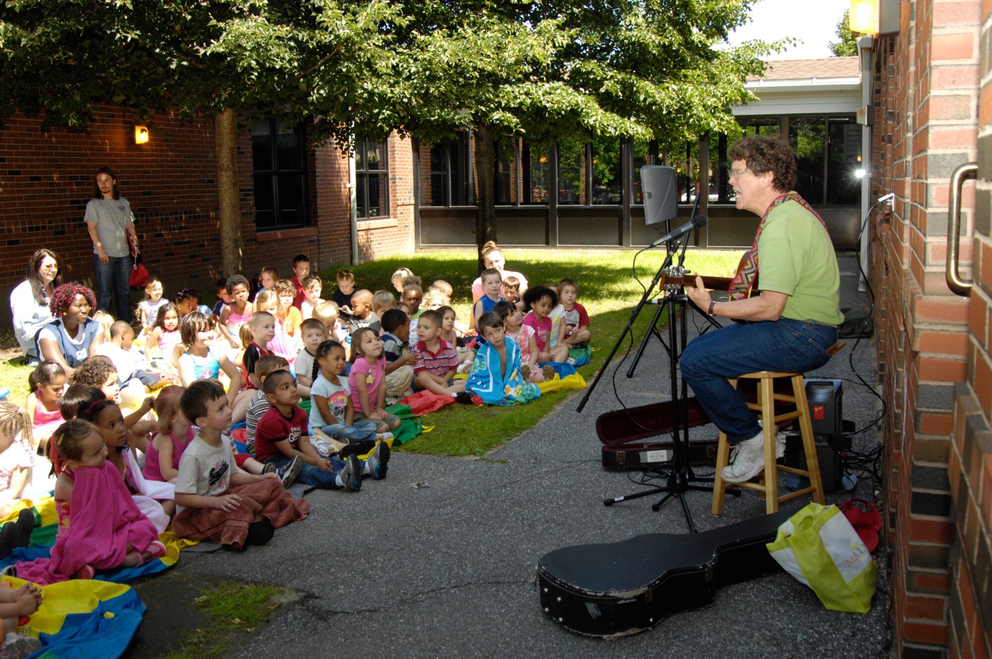 HANSCOM AIR FORCE BASE, Mass. –Hanscom’s Child Development Center hosted a sing along performance for CDC children led by Hugh Hanley, a local children’s performing artist on July 14. (U.S. Air Force photo by Linda LaBonte Britt) 