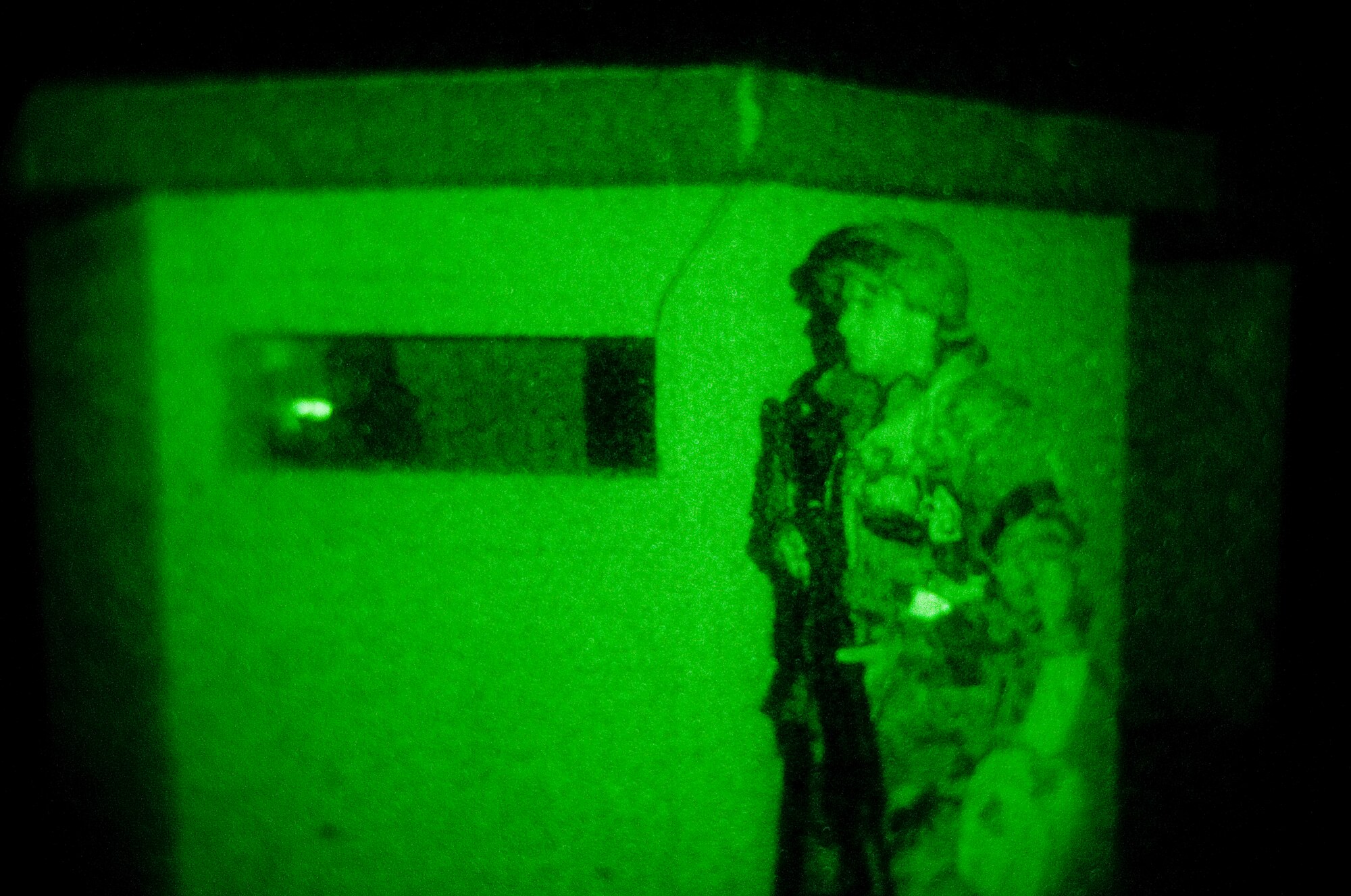KUNSAN AIR BASE, Republic of Korea -- Senior Airman Jeffrey Stepp takes up a defensive position to guard 8th Communications Squadron assets July 21. Airman Stepp is a voice network systems technician from the 8th Communications Squadron   and will stand guarding communication's personnel and resources. (U.S. Air Force photo by Senior Airman Jonathan Steffen)