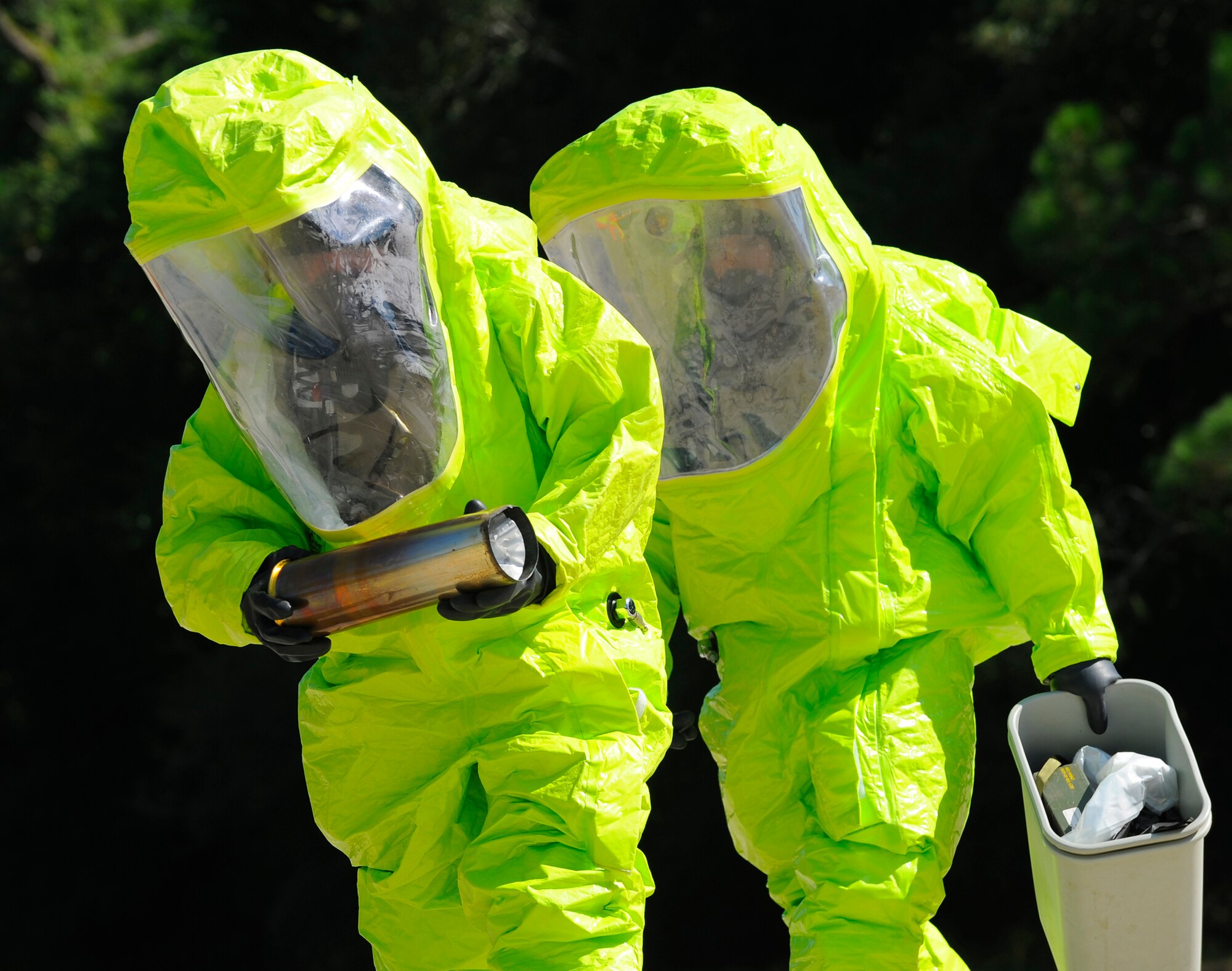 HURLBURT FIELD, Fla. ? Two Explosive Ordnance Disposal technicians carry munitions during a mass casualty exercise Jul 20. The exercise tested Hurlburt Field?s ability to respond to terrorist attacks. (U.S. Air Force photo/Senior Airman Jason Epley)