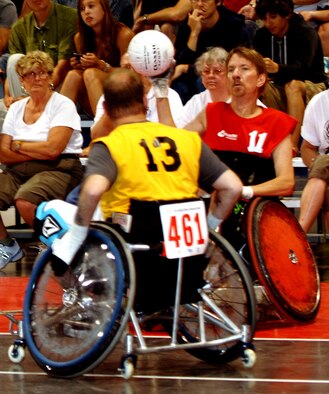 SPOKANE, Wash. – U.S. Marine Corps veteran Todd Kemery throws a ball back into the court during a quad rugby match at the National Veterans Wheelchair Games here July 16. Kemery began playing quad rugby at the NVWG in 2001. He also participated in swimming and softball at the Games this year. Kemery won two gold medals in swimming, one in softball and one in quad rugby. (U.S. Air Force photo / Senior Airman Jocelyn A. Guthrie)



