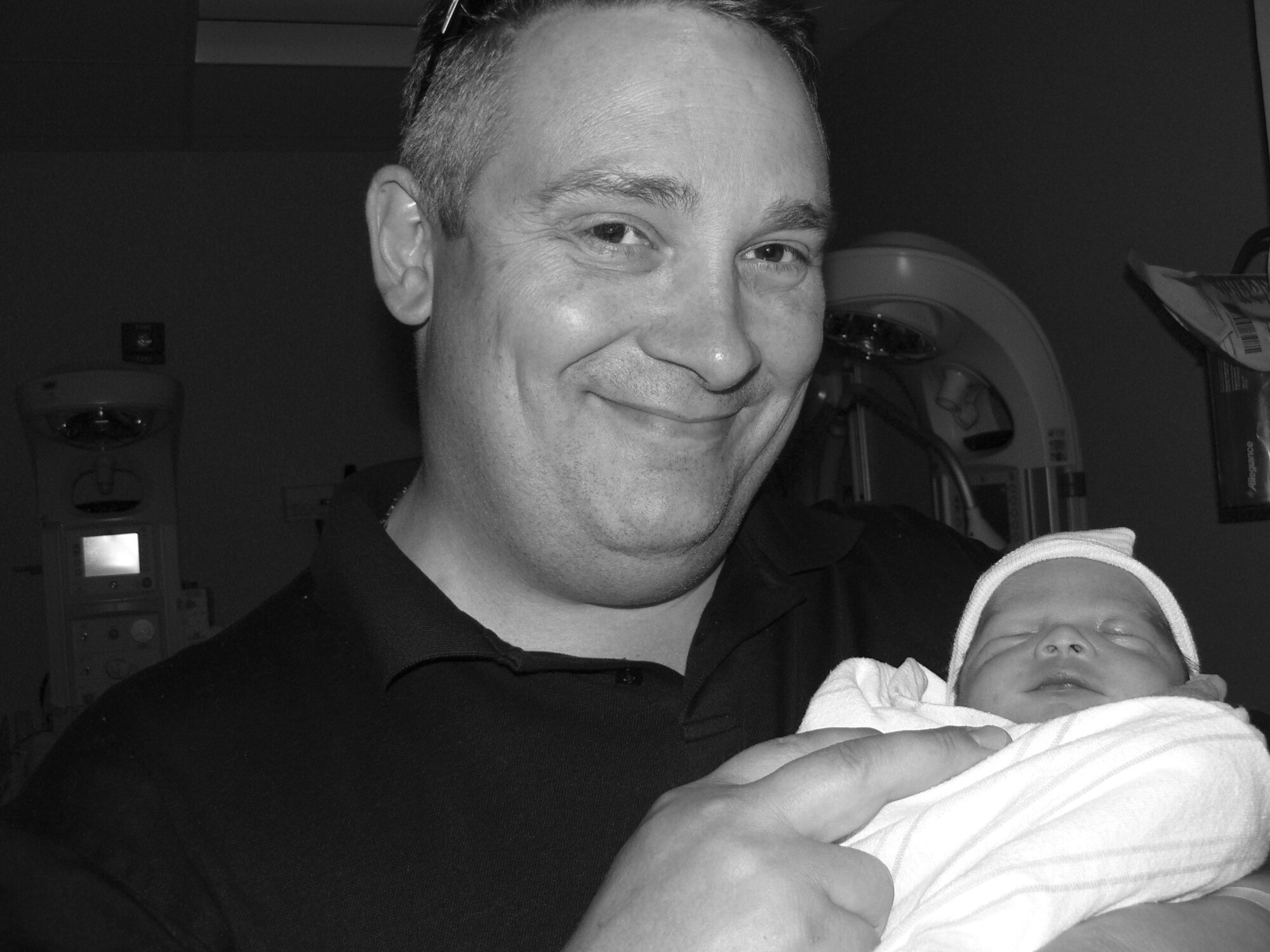 Master Sgt. Steven fury, 944th Communications Flight shop chief, did not anticipate a home birth when his thrid child, Nicholas Tyler Fury arrived on June 16. He credits his 22 years of CPR and self aid buddy care given through the Air Force as really helping him through the process. (U.S. Air Force courtesy photo)