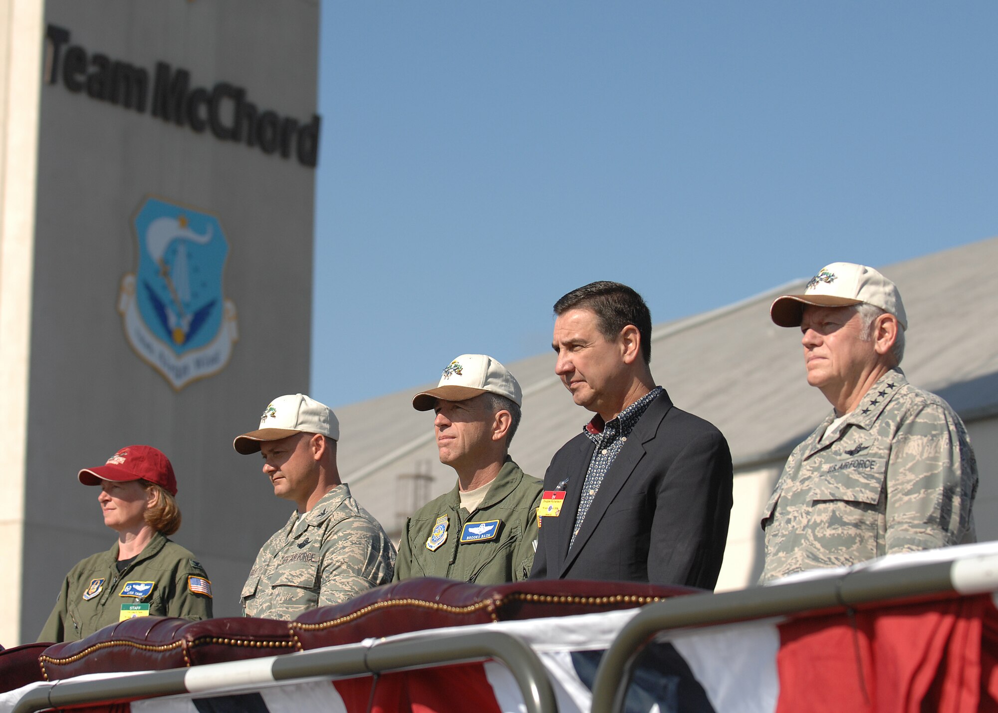 Air Mobility Command Rodeo 2009 official party, led by Gen. Arthur Lichte, right, AMC commander, waits for the opening ceremony to begin July 19 at McChord. (U.S. Air Force photo/Staff Sgt. Stephen Schester)