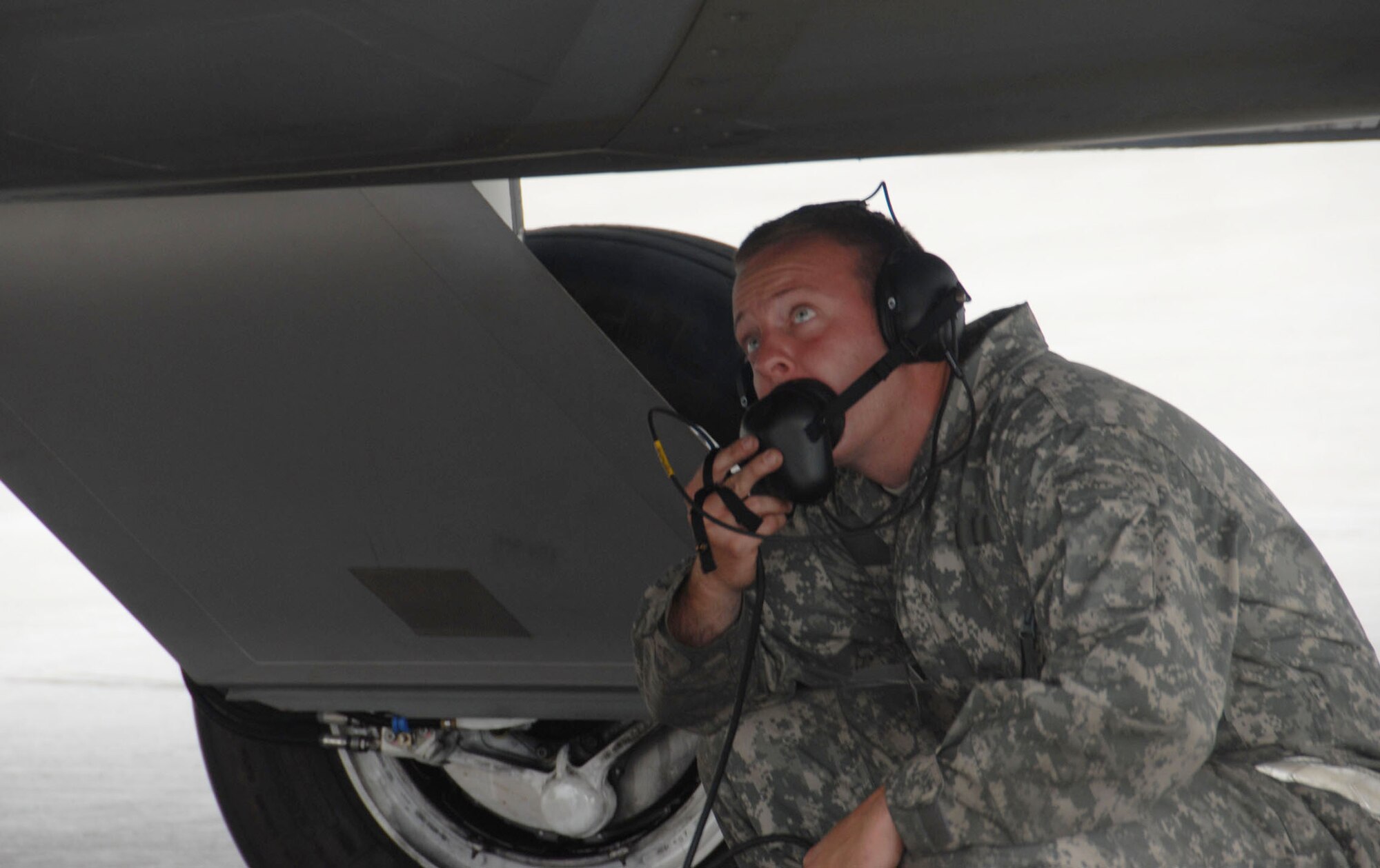 Staff Sgt. Eric Jagodzinski inspects the F-22A Raptor prior to launch during the 477th Fighter Group Unit Training Assembly Saturday.  July?s UTA marked the first opportunity since the group?s activation in October 2007 that its Reservists were able to support, maintain and fly the F-22A Raptors. The 477th FG is the Air Reserve Command?s first F-22 unit and the first Reserve flying unit based in the Pacific theater of operations.  