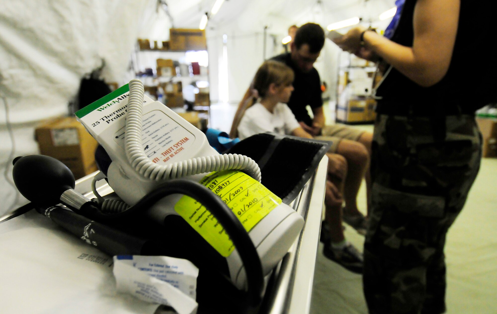 Members from the 36th Medical Group and the 36th Contingency Response Group work together to achieve a rapidly deployable and self-sustaining medical capability during a simulated mass casualty exercise for the Humanitarian Assistance Rapid Response Team July 15 at Andersen Air Force Base, Guam. (U.S. Air Force photo/Airman 1st Class Courtney Witt)