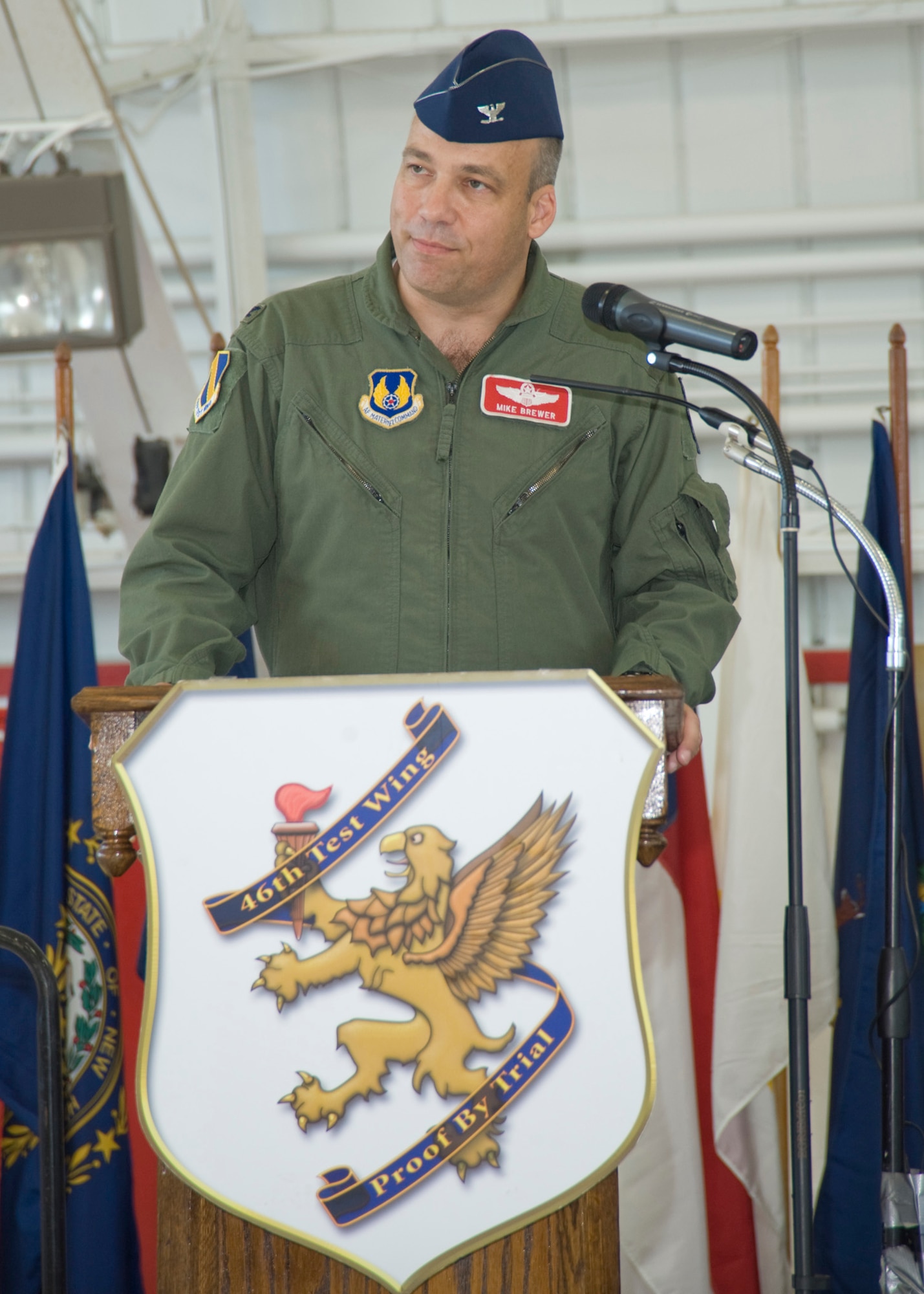 Col. Michael Brewer speaks to his newly assigned wing July 20 after taking command of the 46th Test Wing during a ceremony at Eglin Air Force Base, Fla.  U.S. Air Force photo/Greg Murry.)
