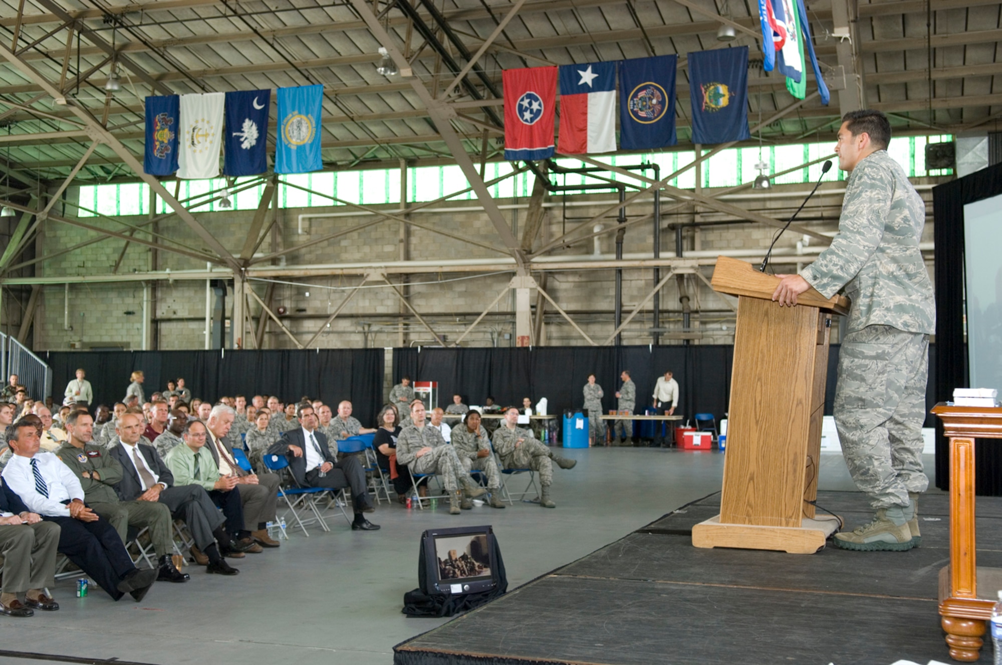 HANSCOM AIR FORCE BASE, Mass. –First Lt. Mike Sciortino of the 66th Medical Group speaks to the crowd gathered at the Heritage of Freedom event on July 16 at the Aero Club hangar. Lieutenant Sciortino spoke about his experiences serving as a combat controller in Afghanistan where he earned the Bronze Star and Purple Heart for his service. The Heritage event also featured Morley Piper, a Work War II veteran who recounted his D-Day experiences as a platoon leader assigned to the 115th Regiment. (U.S. Air Force photo by Mark Herlihy) 