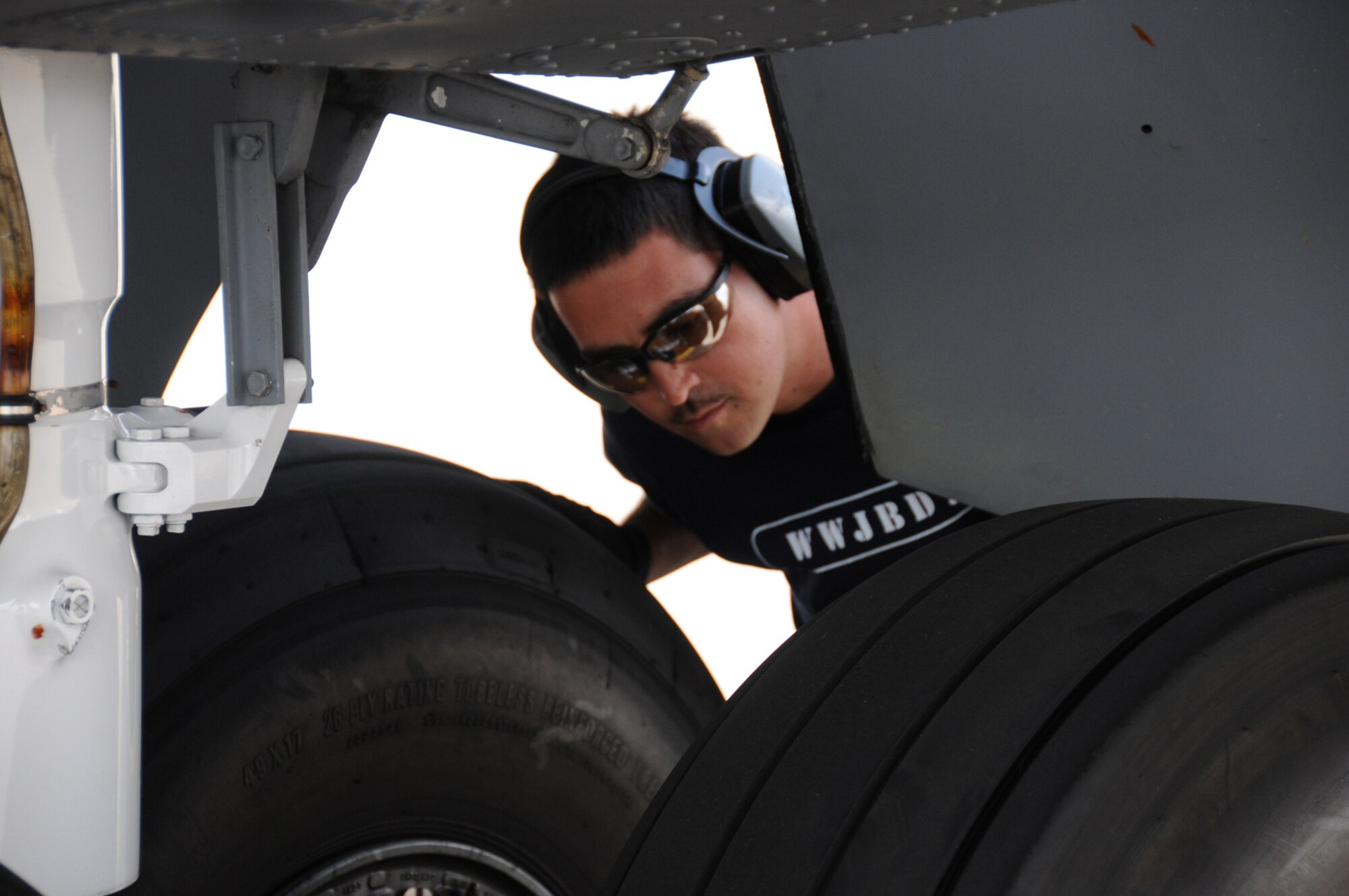 MCCHORD AIR FORCE BASE, Wash. --  A Reservist with the 916th Air Refueling Wing conducts a post-flight landing gear inspection on July 20 at Air Mobility Command's Rodeo Competition. (U.S. Air Force photo by: TSgt. Scotty Sweatt)