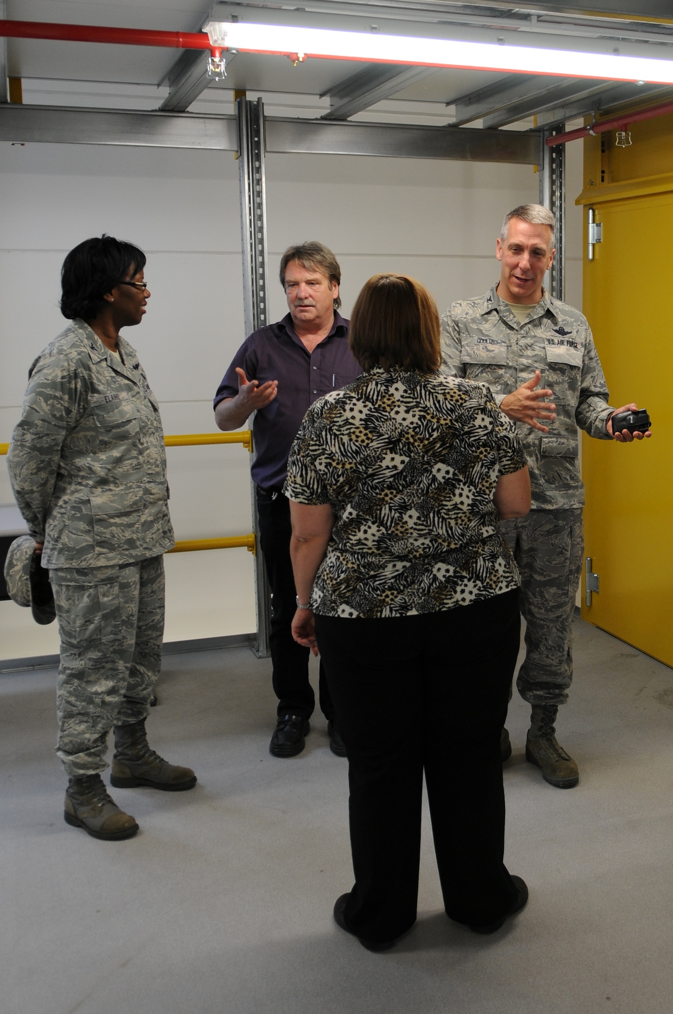 U.S. Air Force Col. Thomas Gould, 435th Air Base Wing commander, tours the new C-130J Hercules parts store, Ramstein Air Base, Germany, July 14, 2009.  The parts store can support up to 20 Mobility Readiness Spares Package(MRSP) pallets, three times more than the older warehouse. (U.S. Air Force photo by Airman 1st Class Caleb Pierce)