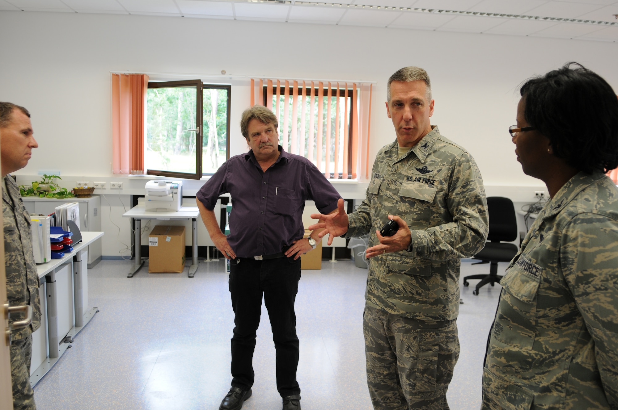 U.S. Air Force Col. Thomas Gould, 435th Air Base Wing commander, tours the new C-130J Hercules parts store, Ramstein Air Base, Germany, July 14, 2009. The parts store will be a 24 hour a day, seven days a week operation, allowing maintainers the parts they need when they need them.(U.S. Air Force photo by Airman 1st Class Caleb Pierce)