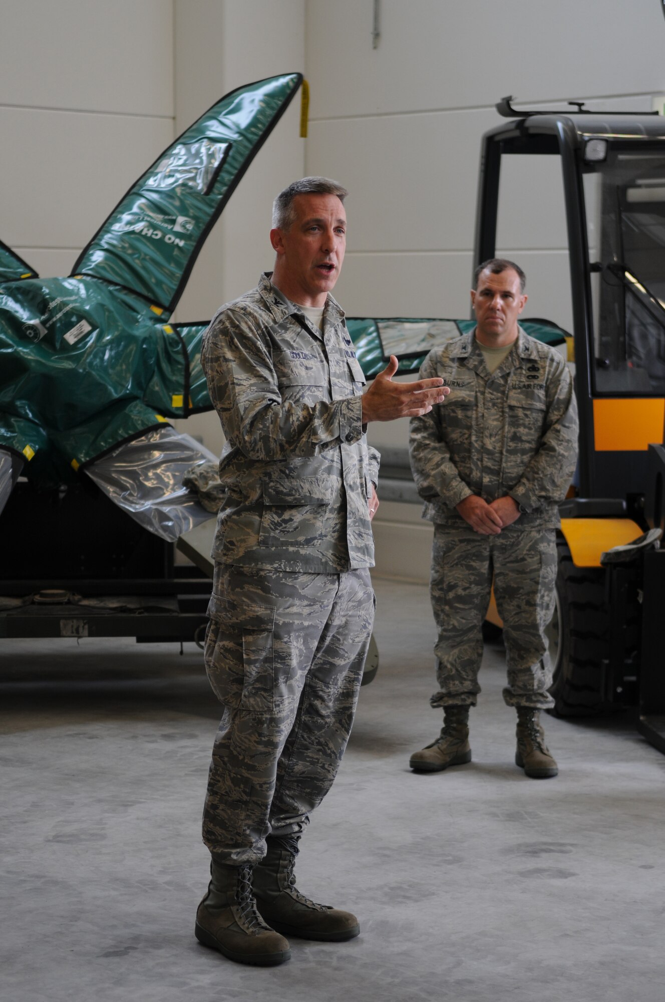 U.S. Air Force Col. Thomas Gould, 435th Air Base Wing commander, tours the new C-130J Hercules parts store, Ramstein Air Base, Germany, July 14, 2009.  The location of the new parts store allows airmen maintaining the C-130J close proximity to the parts they need. (U.S. Air Force photo by Airman 1st Class Caleb Pierce)