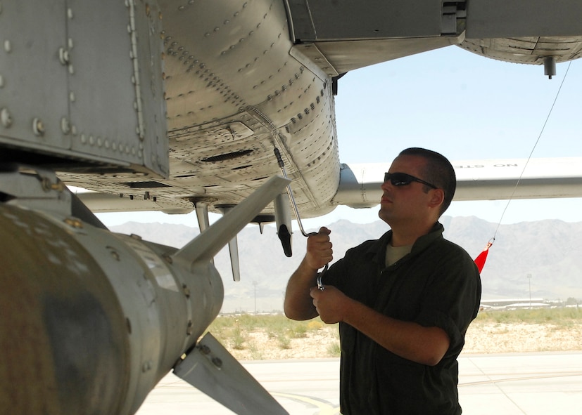 BAGRAM AIRFIELD, Afghanistan - Staff Sgt. James Irvin, from the 455th Aircraft Maintenance Squadron's 74th Aircraft Maintenance Unit, performs an air cycle machine inspection to ensure the A-10 Thunderbolt functions properly, here July 20. Sergeant Irvin is deployed from the 23rd Aircraft Maintenance Squadron, Moody Air Force Base, Ga. and hails from Kerrville, Texas.  They support Coalition forces on a daily basis in support of Operation Enduring Freedom. (U.S. Air Force photo/Senior Airman Felicia Juenke)