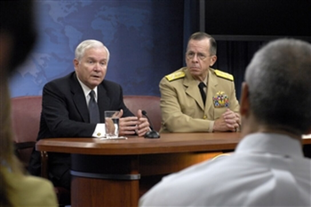 Secretary of Defense Robert M. Gates responds to a reporter's question concerning troop levels in Afghanistan during a Pentagon press briefing with Chairman of the Joint Chiefs of Staff Adm. Mike Mullen, U.S. Navy, on July 20, 2009.  