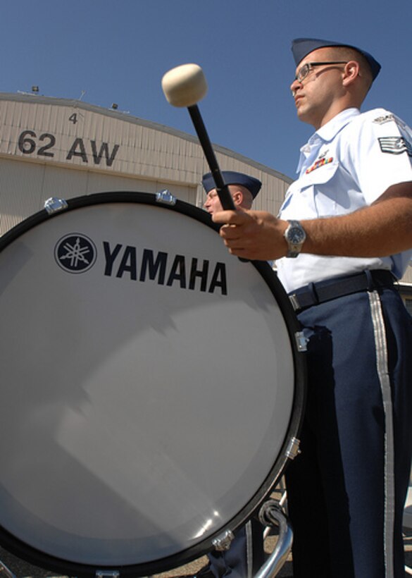 Staff Sgt. Alex Nikiforoff performs with the U.S. Air Force Band of The Golden West during the opening ceremony of Air Mobility RODEO 2009 at McChord Air Force Base, Wash., July 19. RODEO is an international combat skills and flying operations competition designed to develop and improve techniques and procedures with our international partners to enhance mobility operations. The Band of The Golden West is stationed out of Travis AFB, Calif., and comprises of 47 musicians on active duty. (U.S. Air Force photo/Staff Sgt. Stephen Schester) 