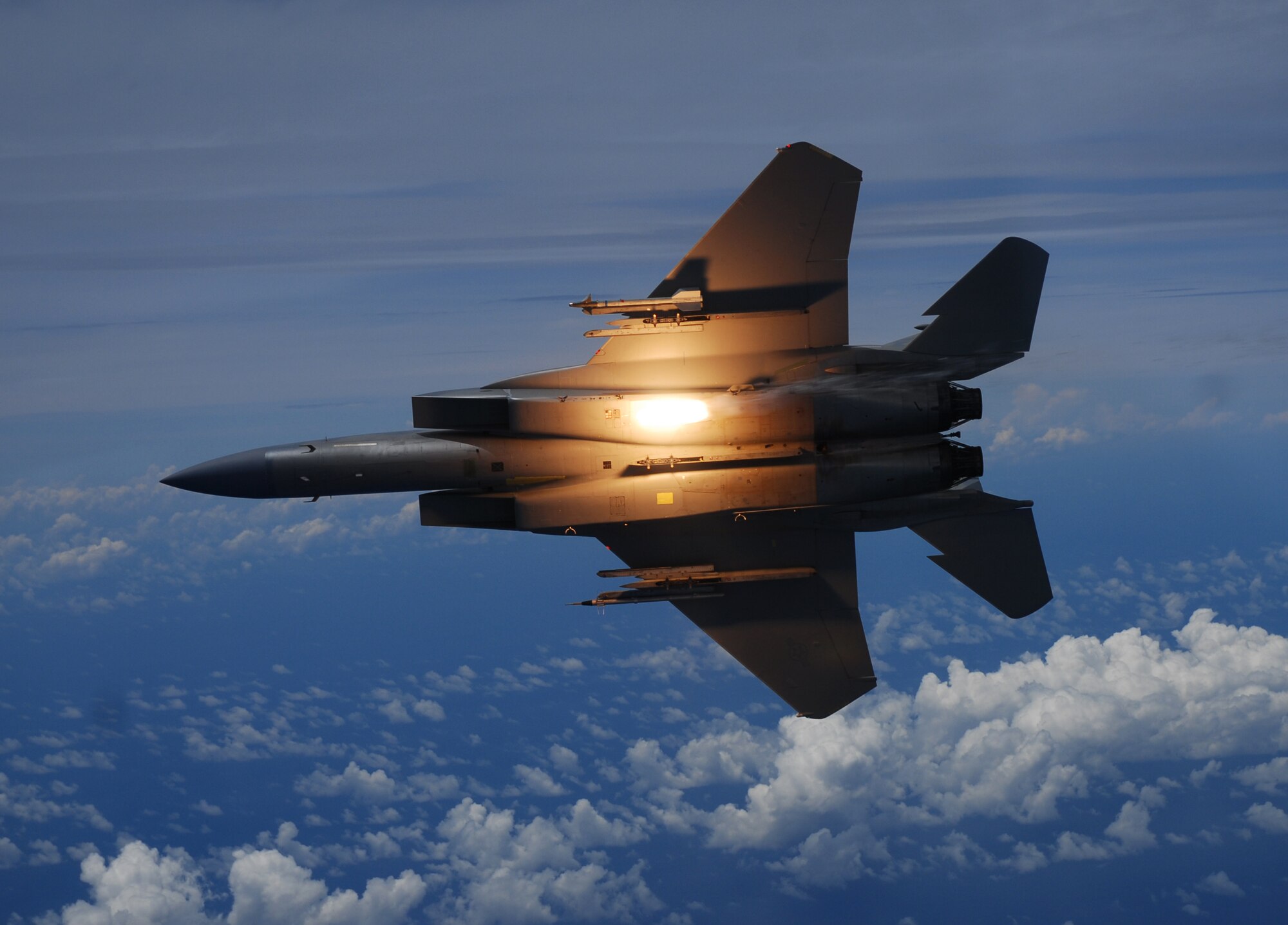 An F-15C Eagle from the 44th Fighter Squadron, Kadena Air Base, releases a flare over the island of Okinawa, Japan July 22, 2009. The mission took place during a total solar eclipse, a rare opportunity for service members stationed here to witness this unique event. (U.S. Air Force photo/Airman 1st Class Chad Warren)