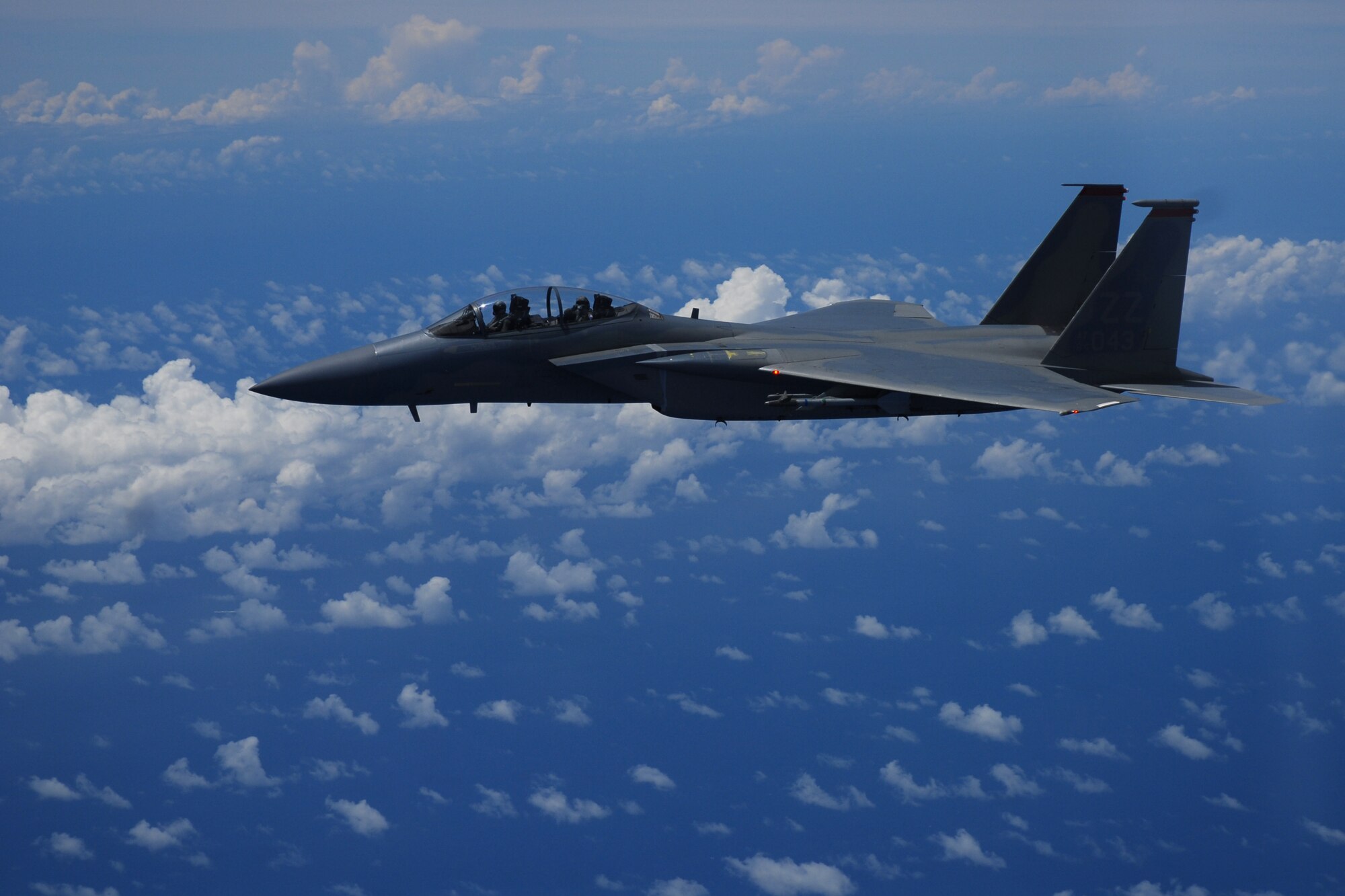 An F-15C Eagle from the 44th Fighter Squadron, Kadena Air Base, flies over the island of Okinawa, Japan July 22, 2009. The mission took place during a total solar eclipse, a rare opportunity for service members stationed here to witness this unique event. (U.S. Air Force photo/Airman 1st Class Chad Warren)