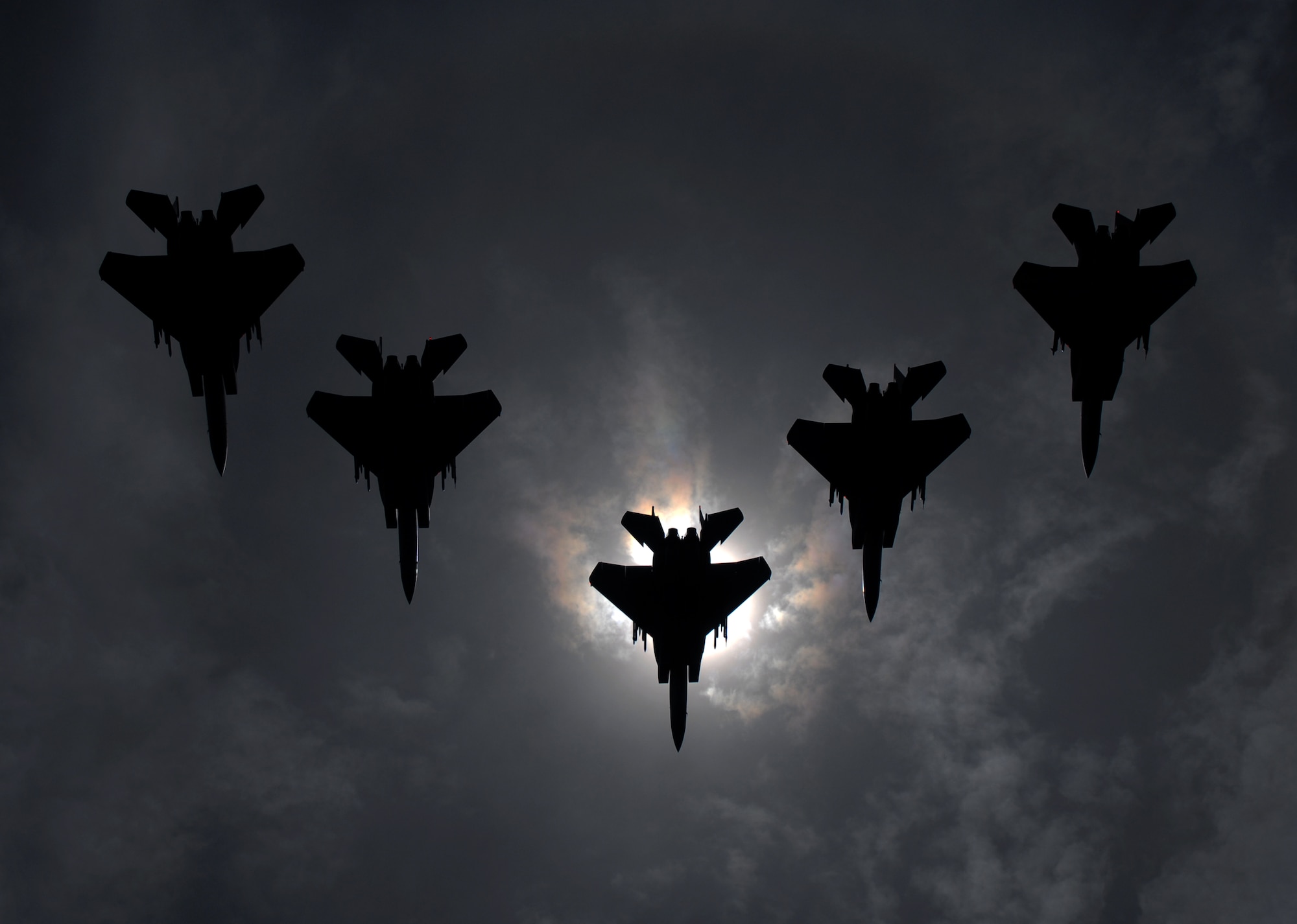 A flight of F-15C Eagles from the 44th Fighter Squadron, Kadena Air Base, flies during a total solar eclipse over the island of Okinawa, Japan July 22. The eclipse was a rare opportunity for service members stationed here to witness this unique event. (U.S. Air Force photo/Airman 1st Class Chad Warren)