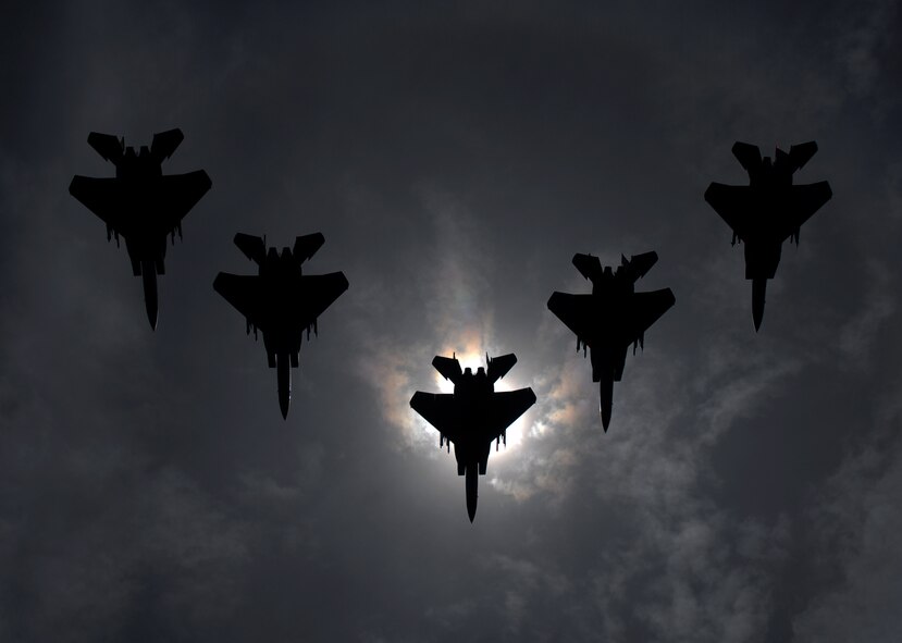 Airman 1st Class Chad Warren, now assigned to Barksdale Air Force Base, La., earned second place honors in the pictorial photograph category of the 2010 Air Force Media Contest for his perfectly-timed photo of 44th Fighter Squadron F-15s during a solar eclipse last year. The photo was featured on the back cover of November-December 2009 edition of Airman Magazine.(Air Force/Airman 1st Class Chad Warren)