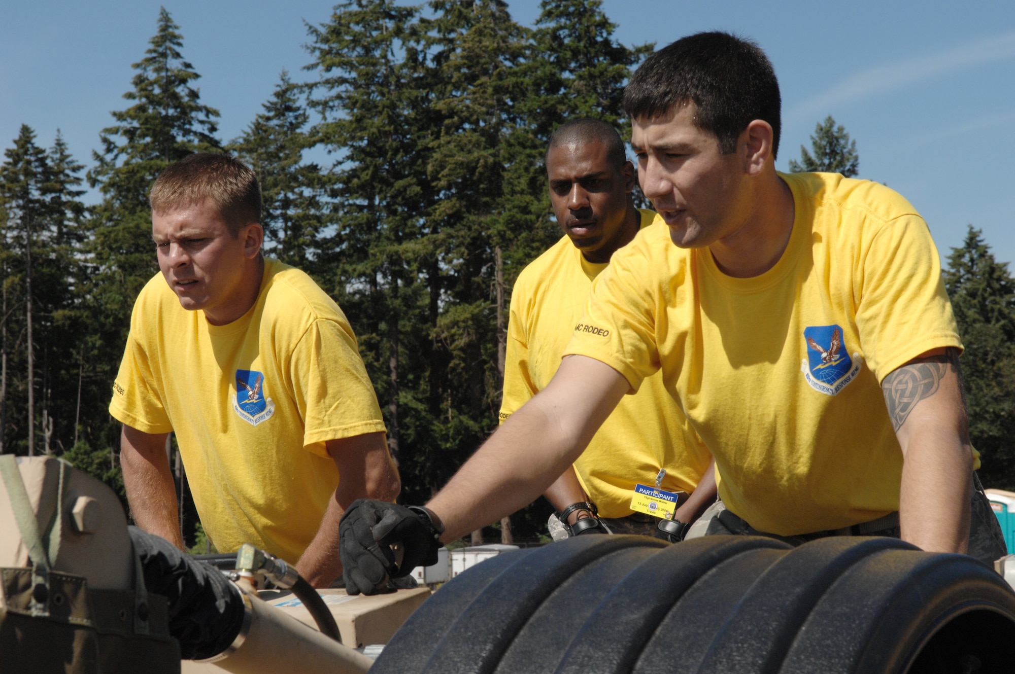 Airmen from 615th Contingency Response Wing of Travis Air Force Base, Calif., assemble the hardsided expandable light air mobile shelter July 20 during an Air Mobility Rodeo 2009 competition at McChord Air Force Base, Wash. Use of the shelter is a first for Rodeo competition. (U.S. Air Force photo/Senior Airman Eric Ysasi)
