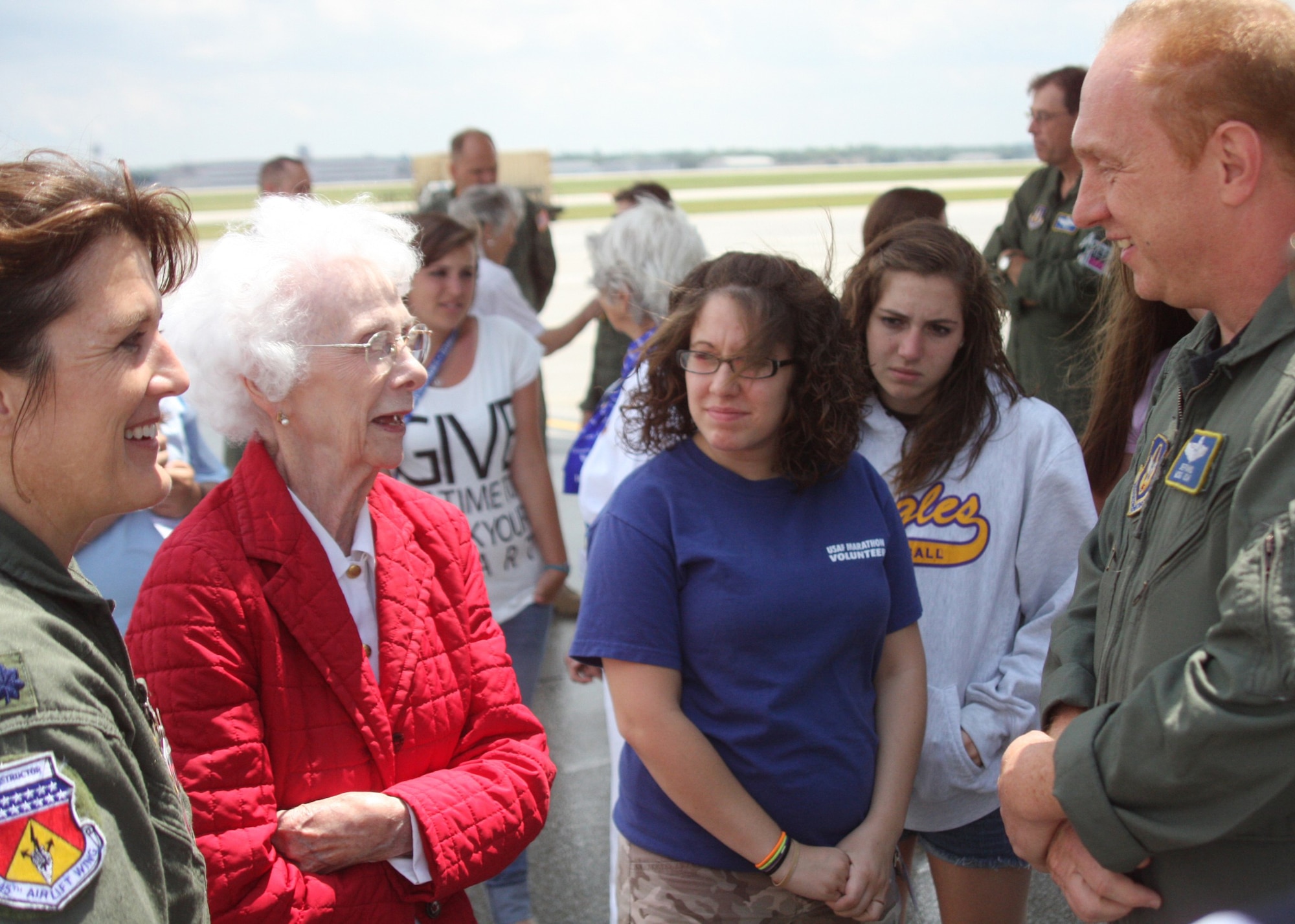WRIGHT-PATTERSON AIR FORCE BASE, Ohio - Francis Brookings, World War II Women Airforce Service Pilots (WASP), shares stories about being a WASP with reservists from the 445th Airlift Wing and to 46 young girls attending the Third Annual Wings of Women Conference July 17.  Part of the conference included a stop at the 445 AW where Ms. Brookings and three other WASPs had the opportunity to listen to a wing mission briefing, learn about the mission of the 445th Aeromedical Evacuation Squadron and tour a C-5 Galaxy aircraft. (Air Force photo/Senior Airman Mikhail Berlin)