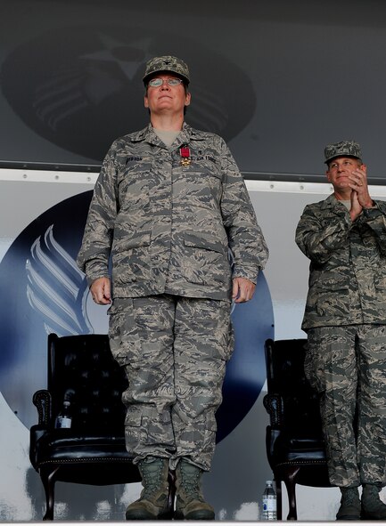 MOODY AIR FORCE BASE, Ga. -- Col. Loraine Anderson, outgoing commander of the 23rd Medical Group, gives her final command to the personnel of the 23rd MDG during a change of command ceremony here July 21. Colonel Anderson has been the commander of the 23rd MDG for three years. (U.S. Air Force photo by Airman 1st Class Joshua Green)
