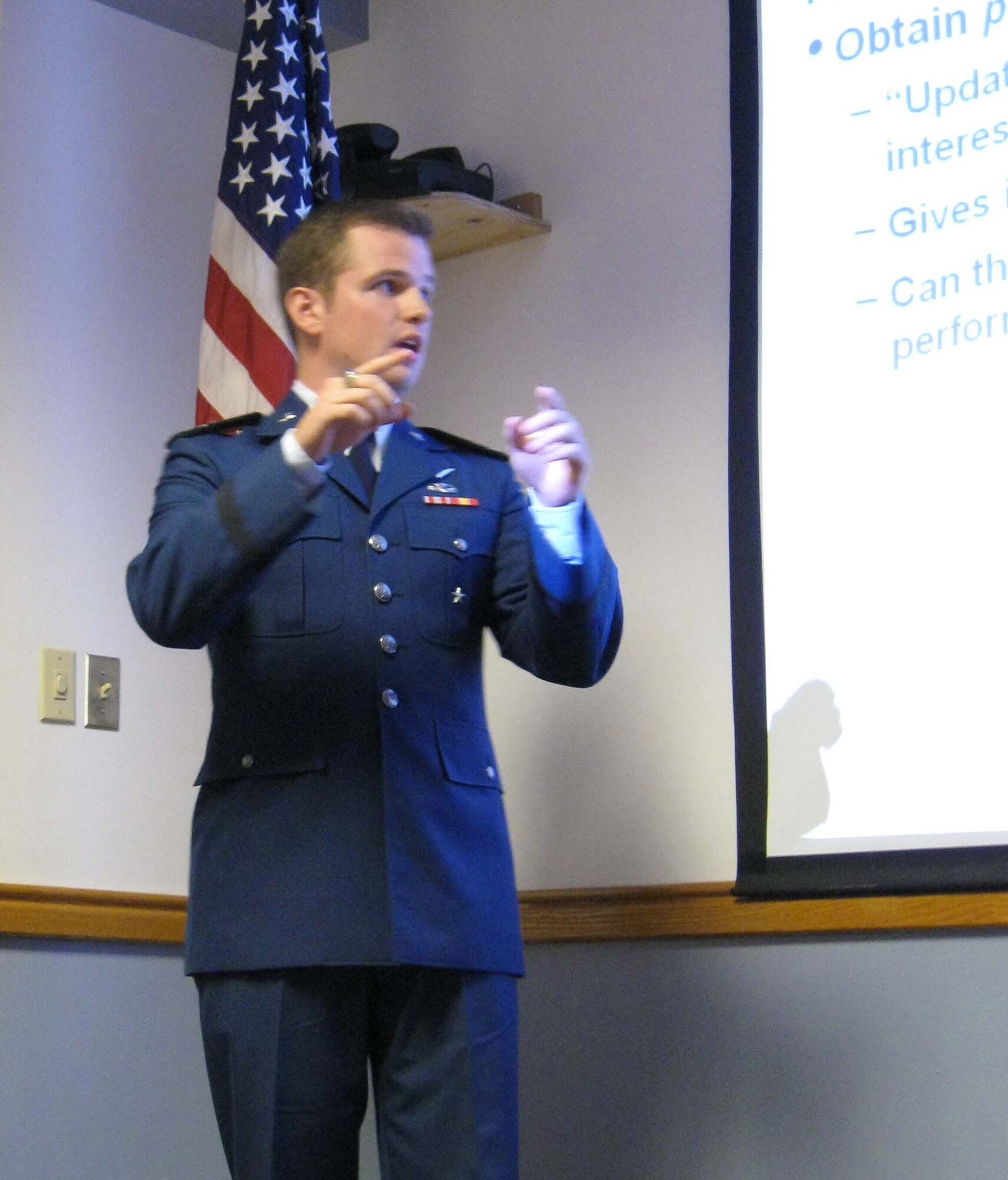 Cadet Cary Reeves explains his work on Bayesian analytic methods to Air Force Operational Test and Evaluation Center personnel at Kirtland Air Force Base, N.M., at the end of the five-week U.S. Air Force Academy Cadet Summer Research Program. AFOTEC hosted the USAFA program for a second year at locations in California, Colorado, Florida, Nevada, and AFOTEC's headquarters at Kirtland. (U.S. Air Force photo)