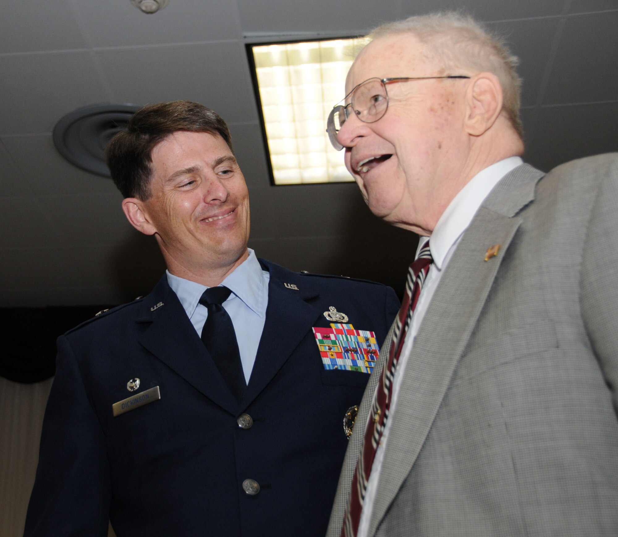 One of General Dickinson’s guests at the ceremony at the Dragon’s Lair was his uncle, retired Army Lt. Col. Wally Lee.  (U.S. Air Force photo by Kemberly Groue)