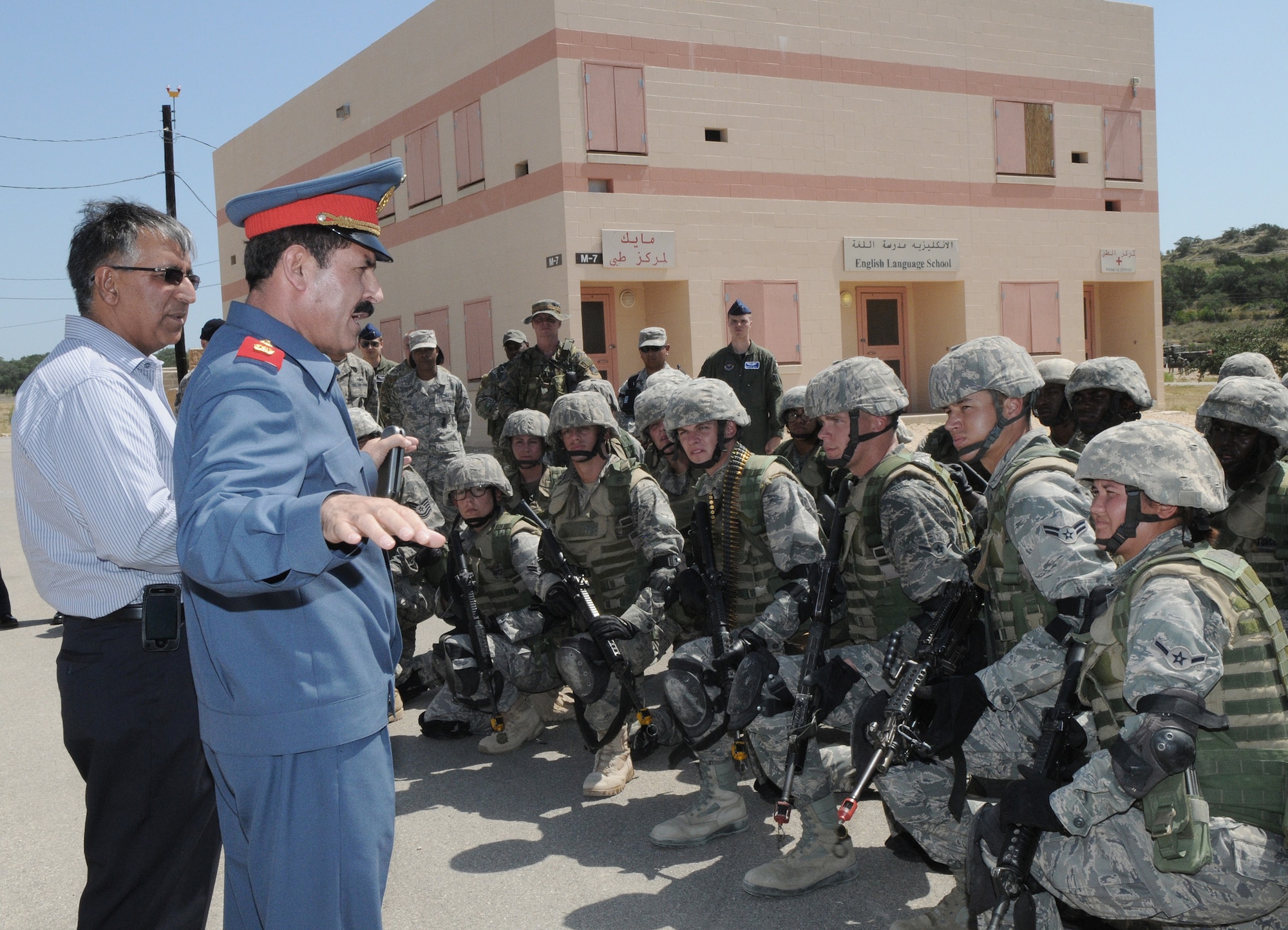 Afghan national air army corps Maj. Gen. Mohammad Dawran speaks to security forces trainees at the Military Operations on Urban Terrain Training Facility July 16 at Camp Bullis, Texas. General Dawran is the Afghan national air army corps commander. The general's visit served to strengthen the training partnerships between the two air forces. (U.S. Air Force photo/Richard McFadden)
