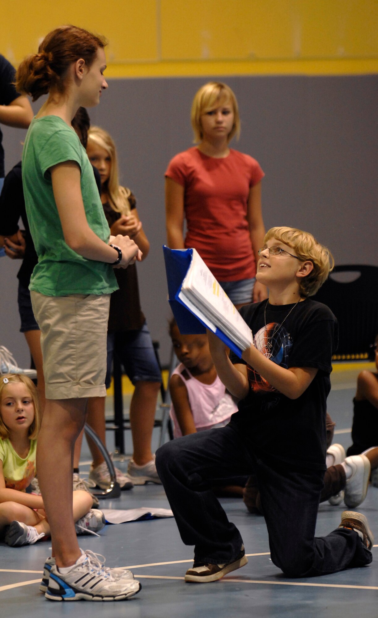 MCCONNELL AIR FORCE BASE, Kan. -- Emily and Nate Borger, children of Ch. (Capt.) Robert Borger, 22nd Air Refueling Wing Chapel, practice for the play “The Princess and the Pea,” directed by the Missoula Children’s Theatre, at the base Youth Center, July 15. The Missoula Children’s Theater is based out of Montana and has involved nearly 1,300 communities this year in their productions. (Photo by Senior Airman Laura Suttles)