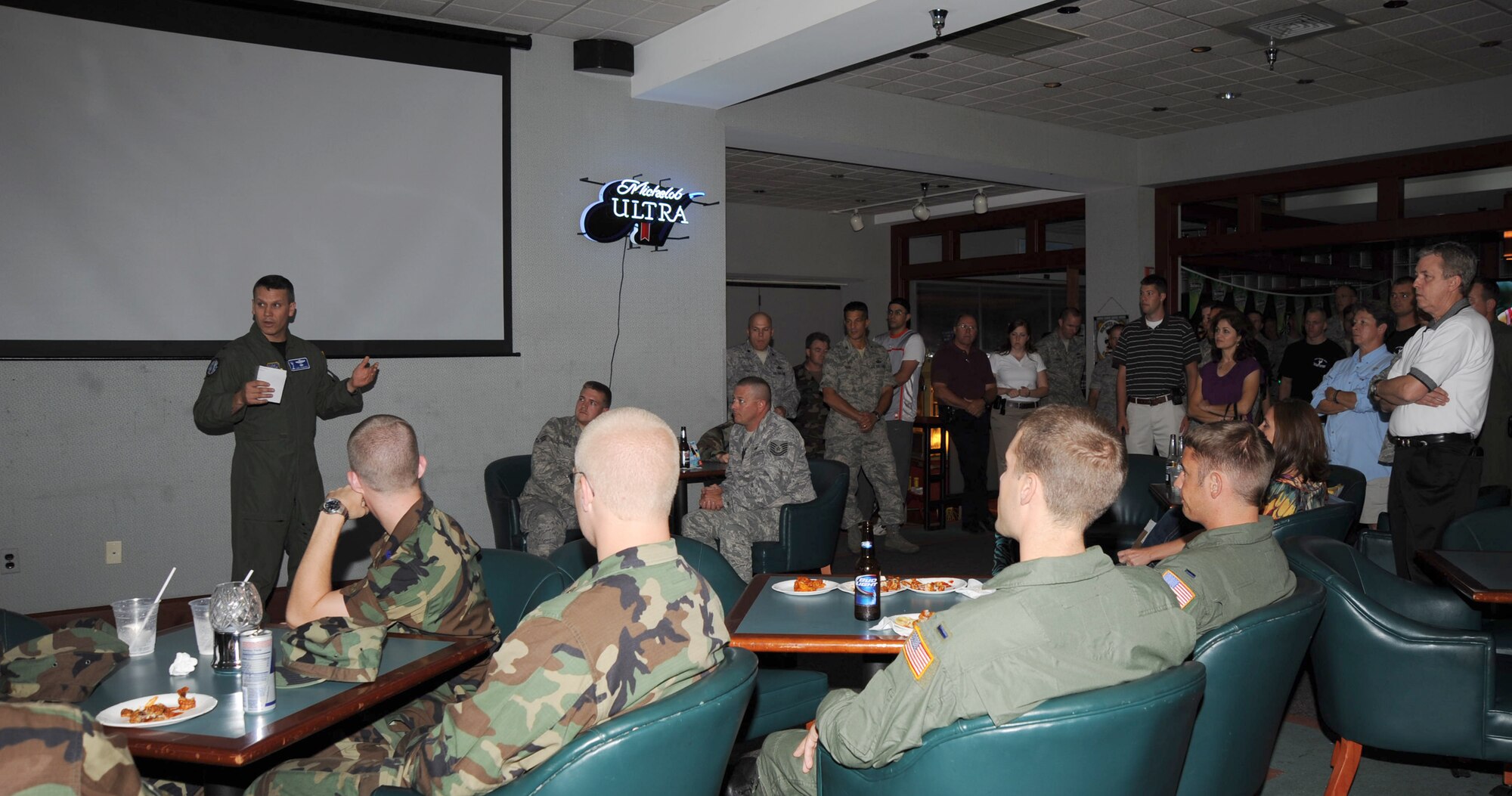 MCCONNELL AIR FORCE BASE, Kan. -- Col. Jamie C. Crowhurst, 22nd Air Refueling Wing commander, briefs Team McConnell members at the Storm Cellar, July 17. Team McConnell members gathered to say farewell to the rodeo team as they head to McChord AFB, Wash., for the next week to display Air Refueling Excellence. (Photo by Technical Sgt. Chyrece Campbell)