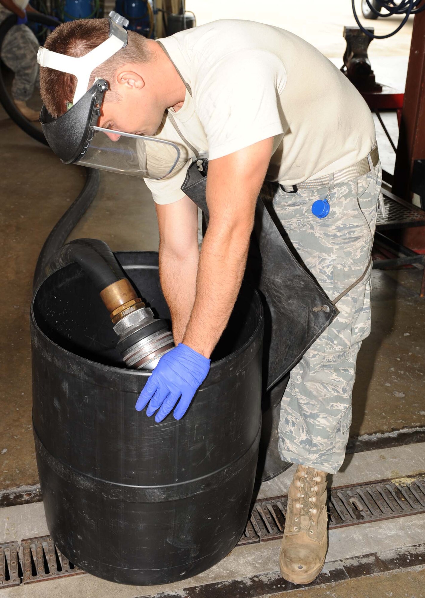 Senior Airman Bennie Powell, 4th Logistics Readiness Squadron petroleum, oil, lubricant technician, performs a hydrostatic hose test on Seymour Johnson Air Force Base, N.C., July 20, 2009. A hydrostatic test ensures the hose will handle pressure while refueling aircraft. (U.S. Air Force photo by Airman 1st Class Gino Reyes)