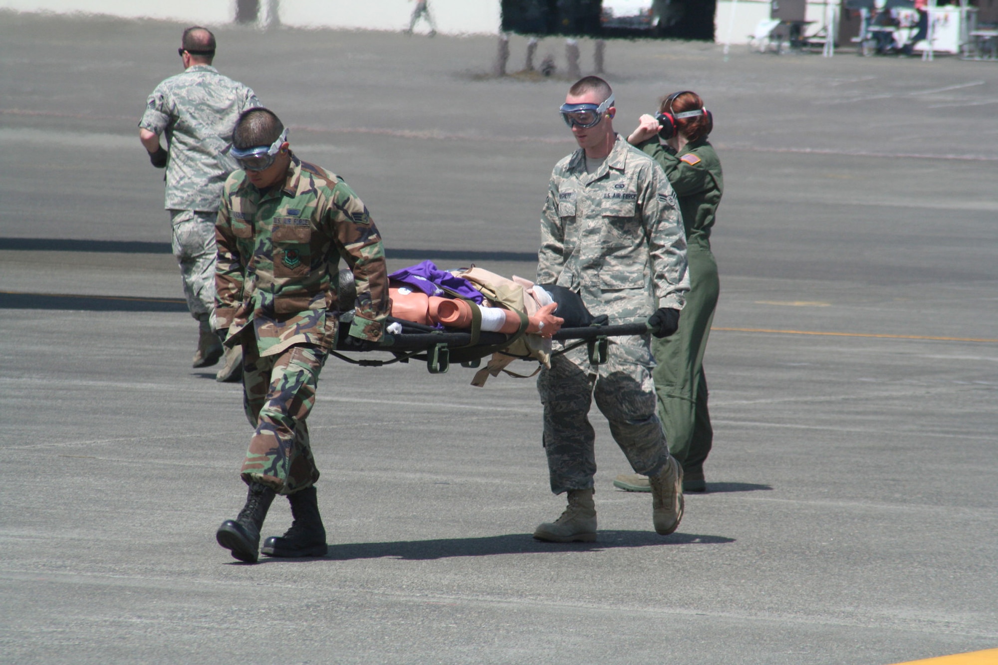 Teams compete in the aeromedical evacuation events for Air Mobility Rodeo 2009 July 20 at McChord Air Force Base, Wash. More than 100 teams are participating in RODEO competition, including teams from seven foreign countries. RODEO is the Air Force's and AMC's premier air mobility competition. It's an international combat skills and flying operations competition designed to develop and improve techniques, procedures and interoperability with international partners to optimize mobility partnerships and enhance mobility operations. (U.S. Air Force Photo/Tech. Sgt. Scott T. Sturkol)