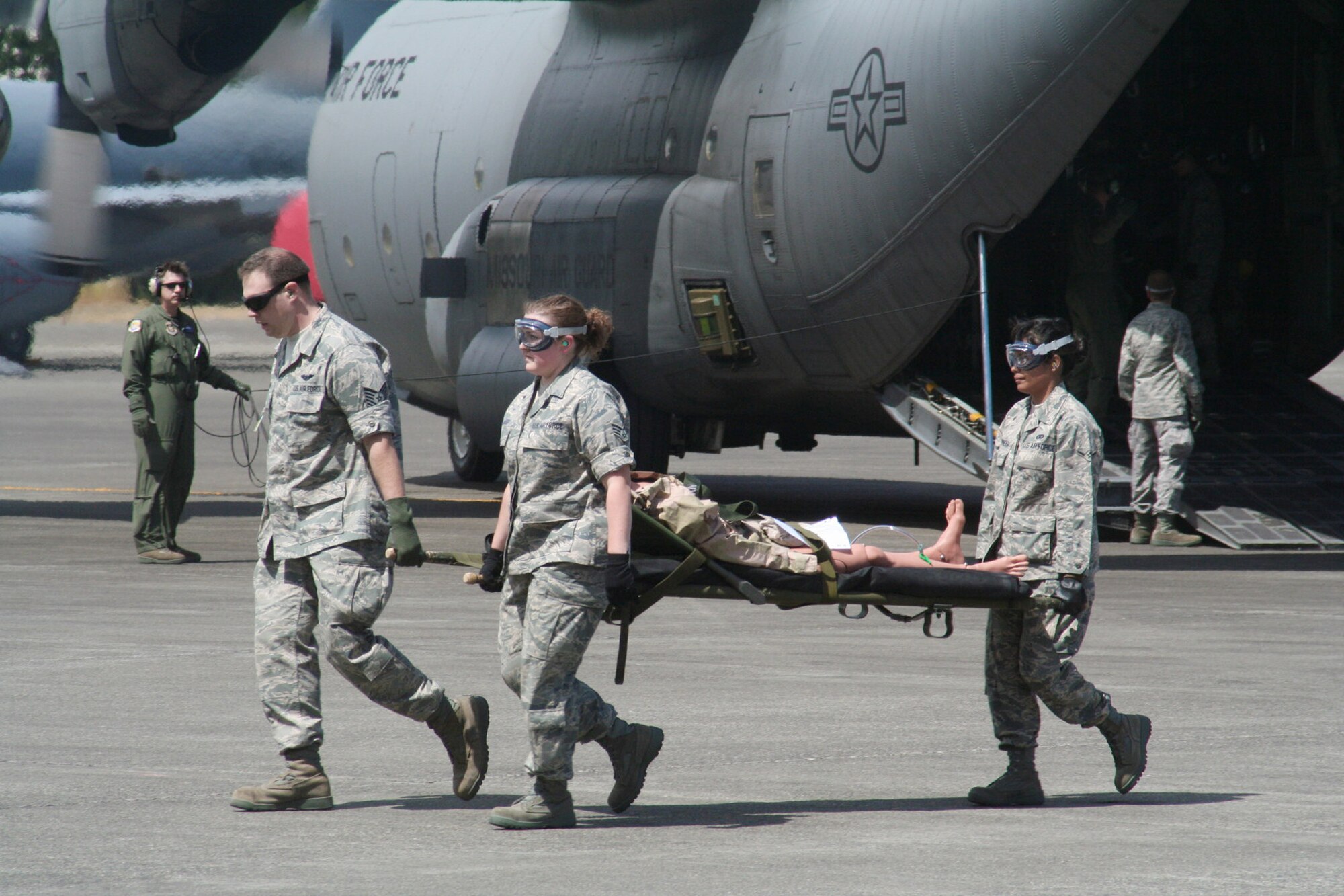 Teams compete in the aeromedical evacuation events for Air Mobility Rodeo 2009 July 20 at McChord Air Force Base, Wash. More than 100 teams are participating in Rodeo competition, including teams from seven foreign countries. Rodeo is the Air Force's and Air Mobility Command's premier air mobility competition. It's an international combat skills and flying operations competition designed to develop and improve techniques, procedures and interoperability with international partners to optimize mobility partnerships and enhance mobility operations. (U.S. Air Force photo/Tech. Sgt. Scott T. Sturkol) 
