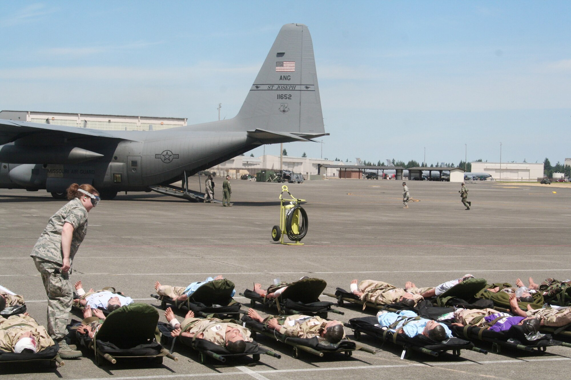 Teams compete in the aeromedical evacuation events for Air Mobility Rodeo 2009 July 20 at McChord Air Force Base, Wash. More than 100 teams are participating in RODEO competition, including teams from seven foreign countries. Rodeo is the U.S. Air Force's and AMC's premier air mobility competition. It's an international combat skills and flying operations competition designed to develop and improve techniques, procedures and interoperability with international partners to optimize mobility partnerships and enhance mobility operations. (U.S. Air Force photo/Tech. Sgt. Scott T. Sturkol) 
