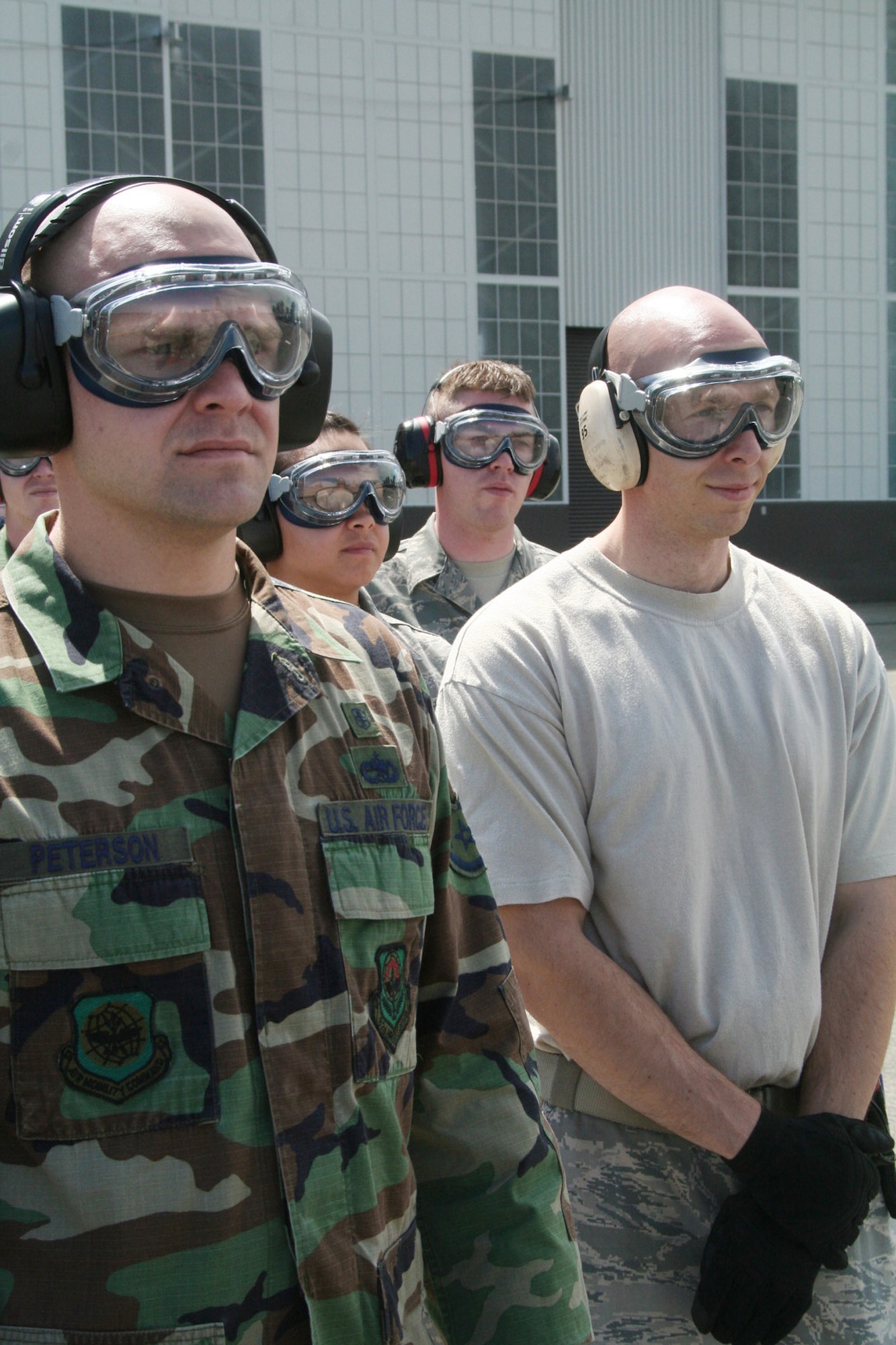 Teams competing in the aeromedical evacuation events for Air Mobility Rodeo 2009 wait in line as the competition commences July 20 at McChord Air Force Base, Wash. More than 100 teams are participating in RODEO competition, including teams from seven foreign countries. RODEO is the Air Force's and Air Mobility Command's premier air mobility competition. It's an international combat skills and flying operations competition designed to develop and improve techniques, procedures and interoperability with international partners to optimize mobility partnerships and enhance mobility operations. (U.S. Air Force photo/Tech. Sgt. Scott T. Sturkol) 
