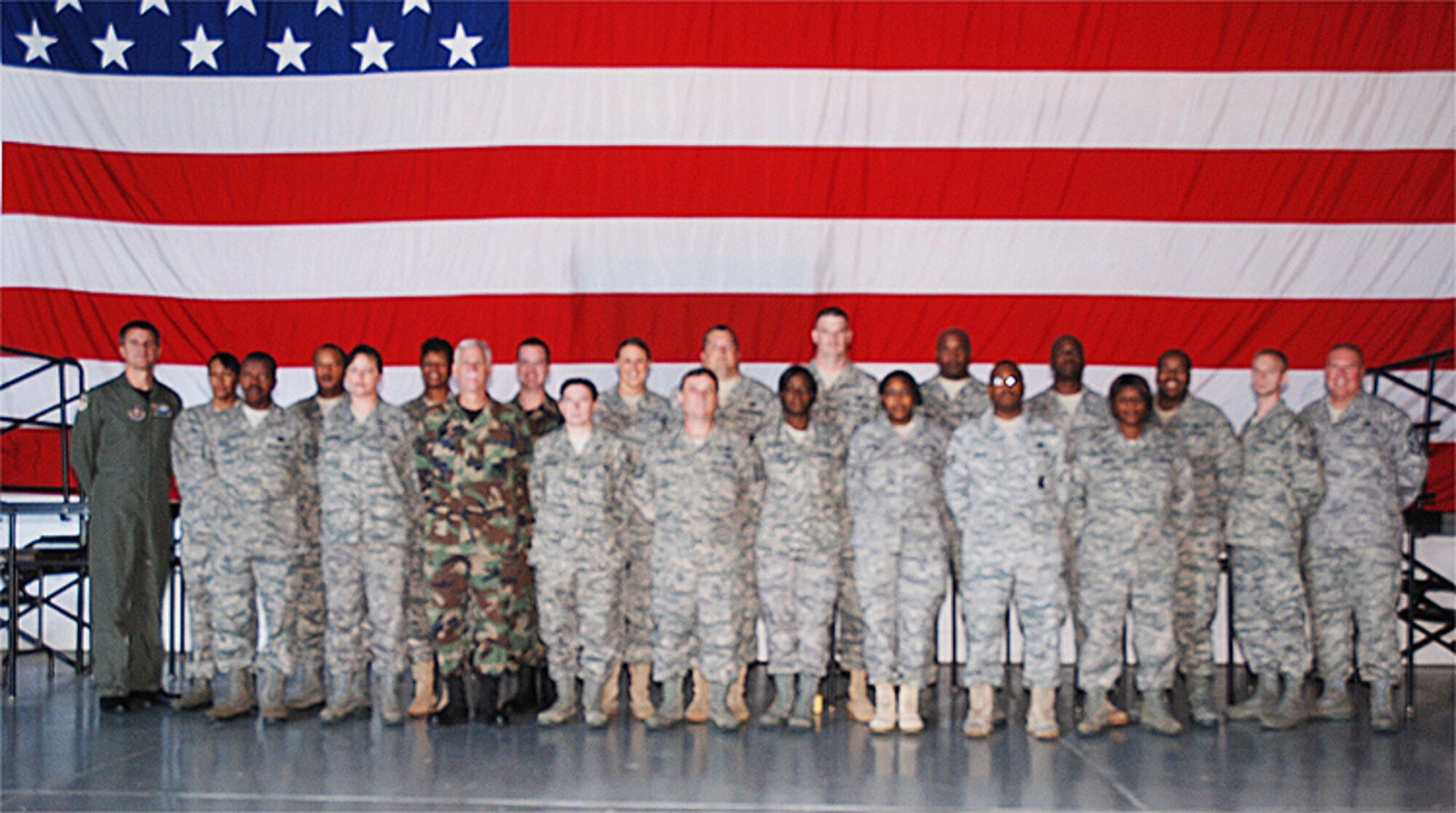 Col. Heath Nuckolls, commander, 94th Airlift Wing and the Command Chief Master Sgt. John M. Anderson welcomed 20 students from across the wing into the NCO Leadership Development Course summer session at Dobbins ARB, Ga here July 20-31. (U.S. Air Force photo/Travon Dennis)