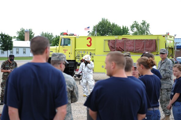 SSgt James Walt from the 124th Fire Department prepares three fire barrels for the flag disposal ceremony put on by the 124th Wing Honor Guard on June 6th, 2009 at Gowen Feild Air Base. (Air Force photo by Staff Sgt Robert Barney)(Released)