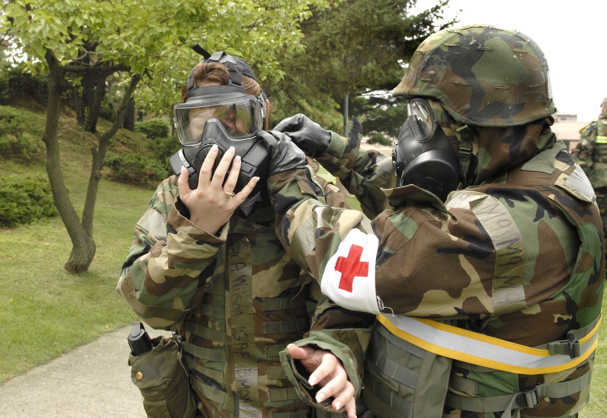 51st Fighter Wing hospital staff respond to a mass casualty outside the hospital after a simulated missile attack during exercise Beverly Bulldog 09-03 on Osan Air Force Base, Republic of Korea, July 22. ( U.S. Air Force photo/Senior Airman Stephenie Wade)