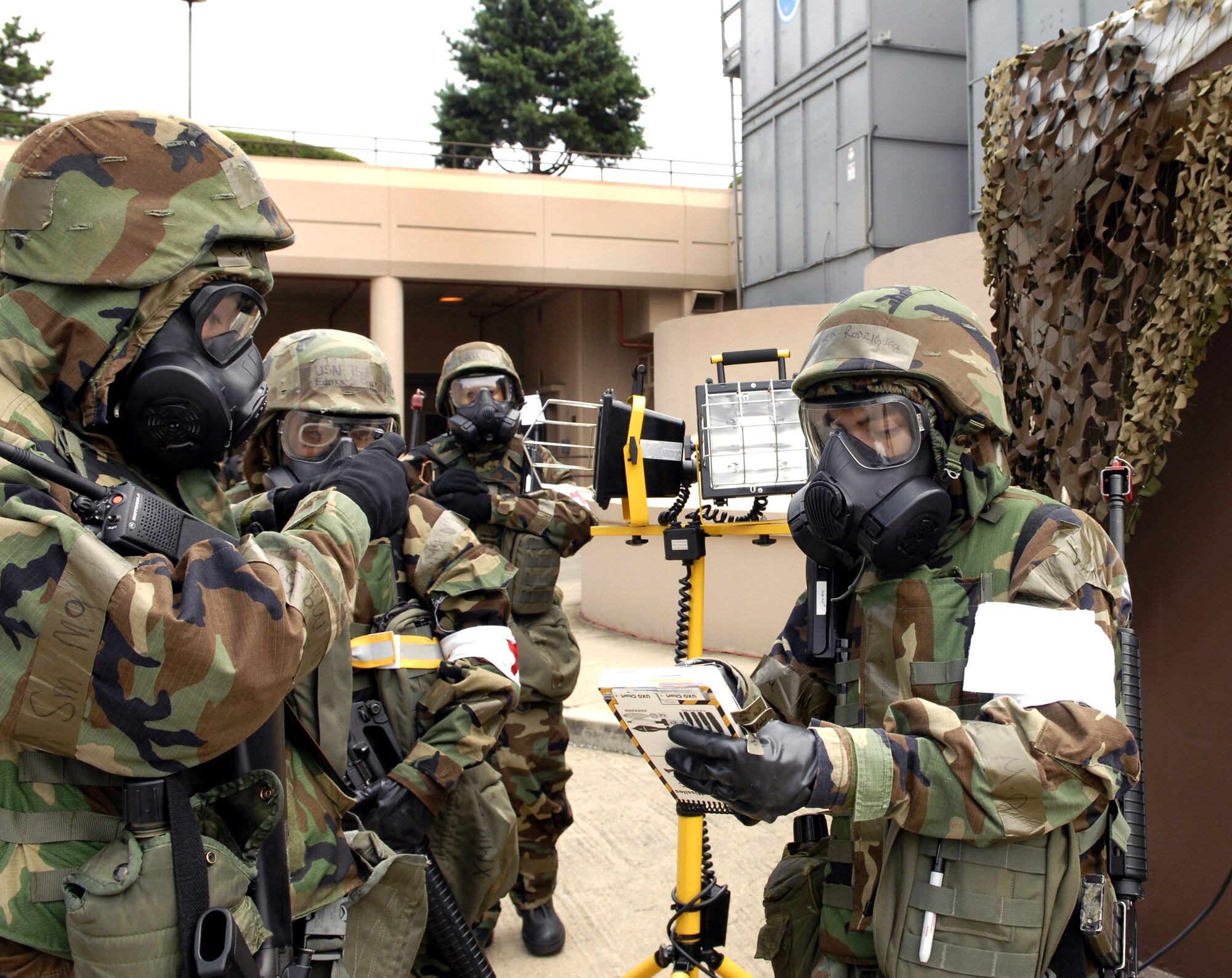 Senior Airman Richard Rodriguez relays information about an unexploded ordinance during exercise Beverly Bulldog 09-03 at Osan Air Base, Republic of Korea. Airman Rodriguez is an entry controller at the 51st Medical Group. (U.S. Air Force photo/Senior Airman Stephenie Wade)