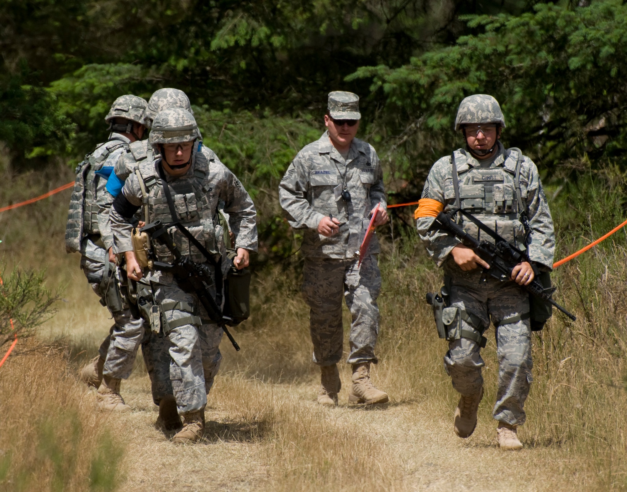 Members of the Team Pope Security Forces Squadron complete the Combat Weapons Course, July 20 at the 2009 Air Mobility RODEO held at McChord AFB, Wash. Team Pope is one of more than 100 teams participating in RODEO competition, including teams from seven foreign countries. (U.S. Photo by Tech. Sgt. Steven Kennedy)
