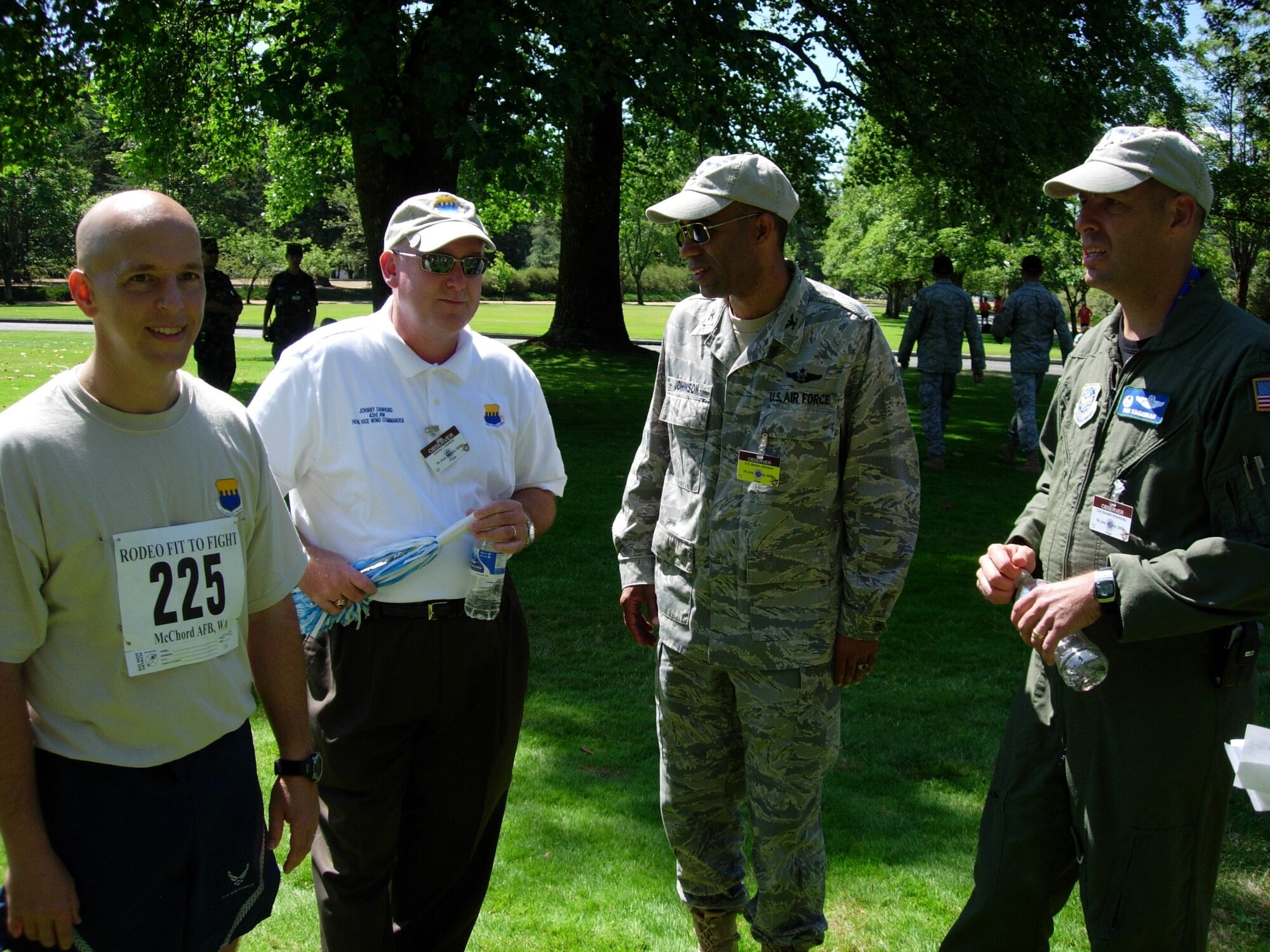 (left to right) Lt. Col. Jonathan Shockey Team Pope RODEO chief, Johhny Dawkins, Honorary 43rd Airlift Wing Vice Wing Commander, Col. James Johnson, 43rd Airlift Wing Commander and Col. Donald Kimmanau, 43rd Operations Group Commander discuss Team Pope’s strategy, July 21 for the 2009 Air Mobility RODEO. Team Pope is one of more than 100 teams participating in RODEO competition, including teams from seven foreign countries. (U.S. Photo by Vicki Johnson)