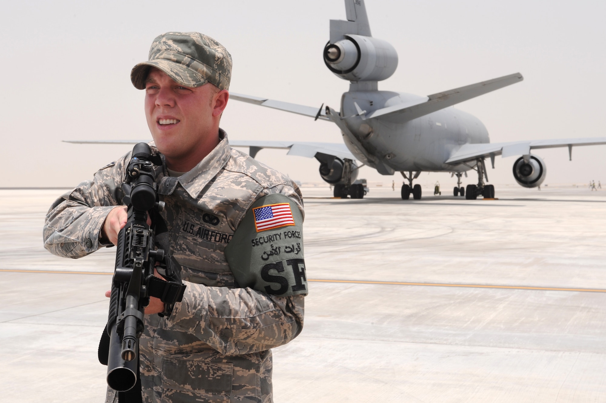 SOUTHWEST ASIA - Senior Airman Zachery Deason, 380th Expeditionary Security Forces Squadron, stands guard in a position called over watch during an exercise July 21. Airman Deason is deployed from Sheppard Air Force base, Texas, and hails from Wichita Falls, Texas. (U.S. Air Force photo Tech. Sgt. Charles Larkin Sr)