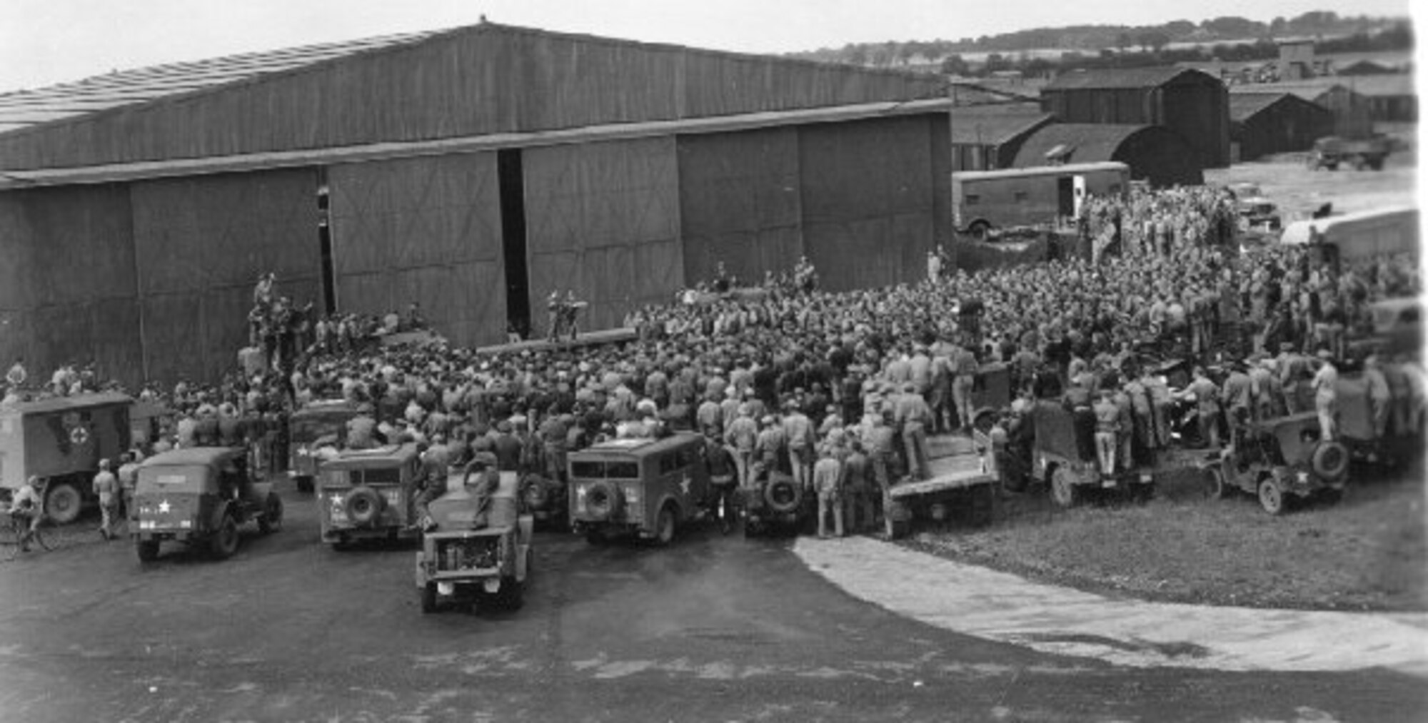 Comedian Bob Hope gave a show for the members of the 303rd Bomb Group on July 6, 1943. On July 21, 2009 three noted Britsih aviation historians stood on the same spot, (Photo Courtesy of 303rd Bomb Group Association)