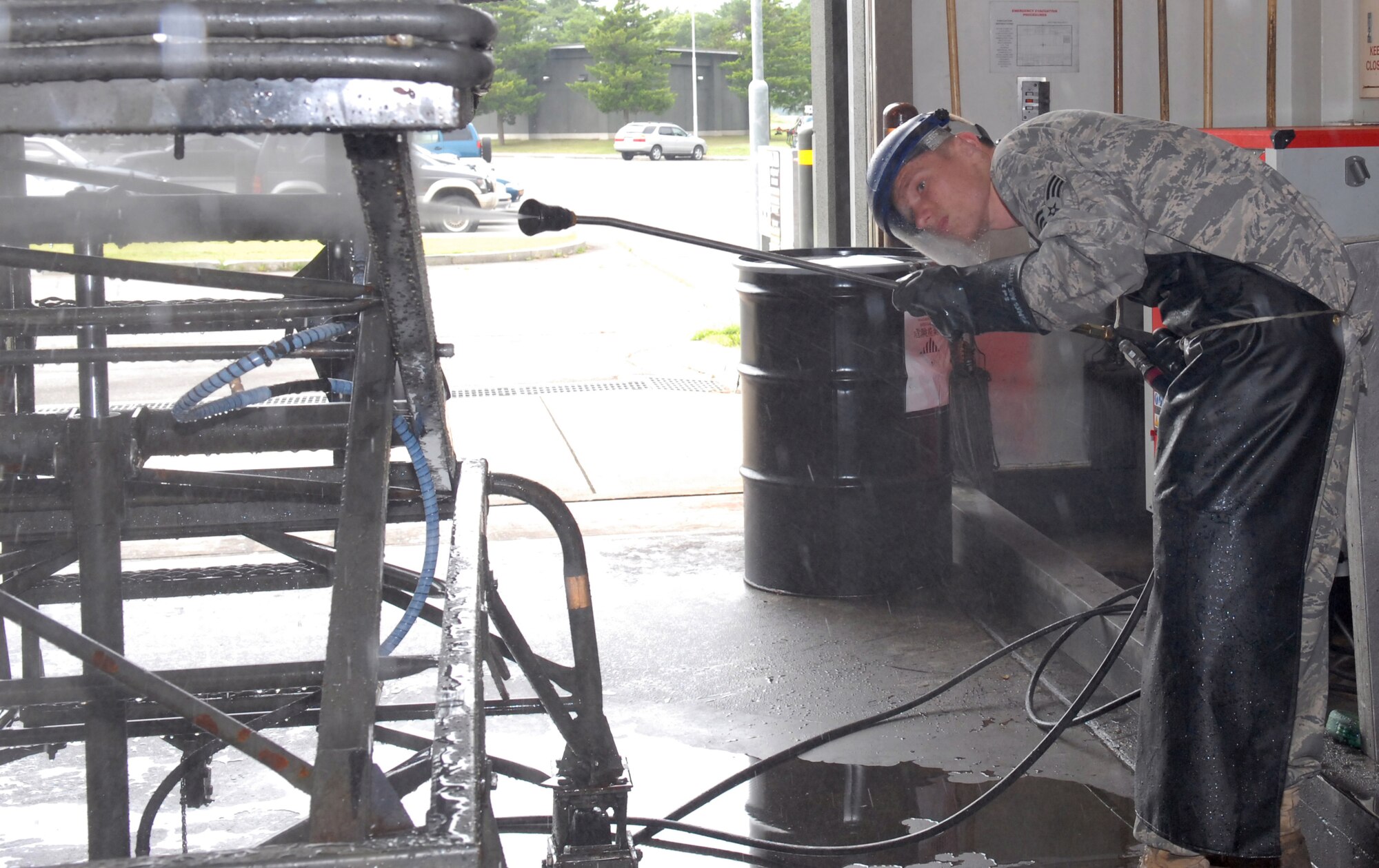AGE of maintenance
MISAWA AIR BASE, Japan ? Senior Airman Taylor Keller, 35th Maintenance Squadron Aerospace Ground Equipment technician, power washes a B4 maintenance stand July 23 in the AGE maintenance building. Periodic cleaning and preventative maintenance of flightline equipment ensures longer life and use. (Air Force photo/Staff Sgt. Phillip Butterfield)

