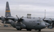 A C-130 Hercules from the Wyoming Air National Guard's 153rd Airlift Wing at Cheyenne departs for a competition mission in Air Mobility RODEO 2009 July 23 at McChord Air Force Base, Wash.  (U.S. Air Force Photo/Tech. Sgt. Scott T. Sturkol)